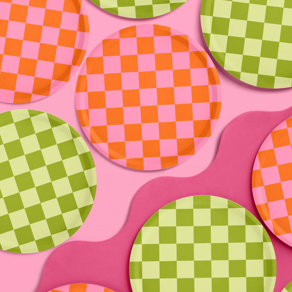Colorful checkered circles on a pink background