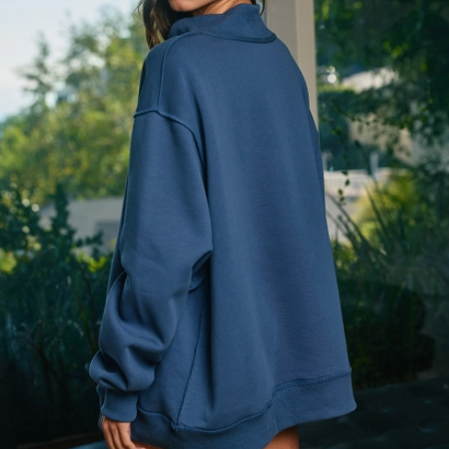 Navy reversible Senior Mom 2027 mock neck sweatshirt shown from the back with relaxed oversized fit and solid navy fabric.
