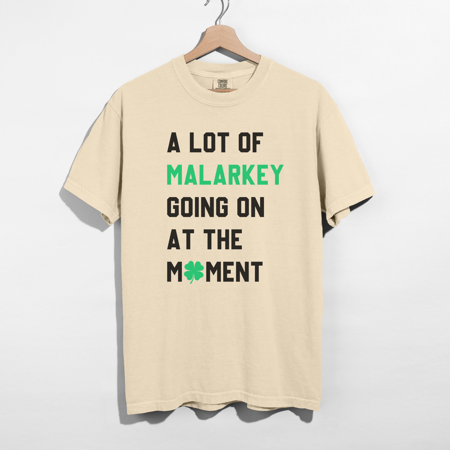 Ivory A Lot of Malarkey Going On at the Moment graphic tee with green clover detail