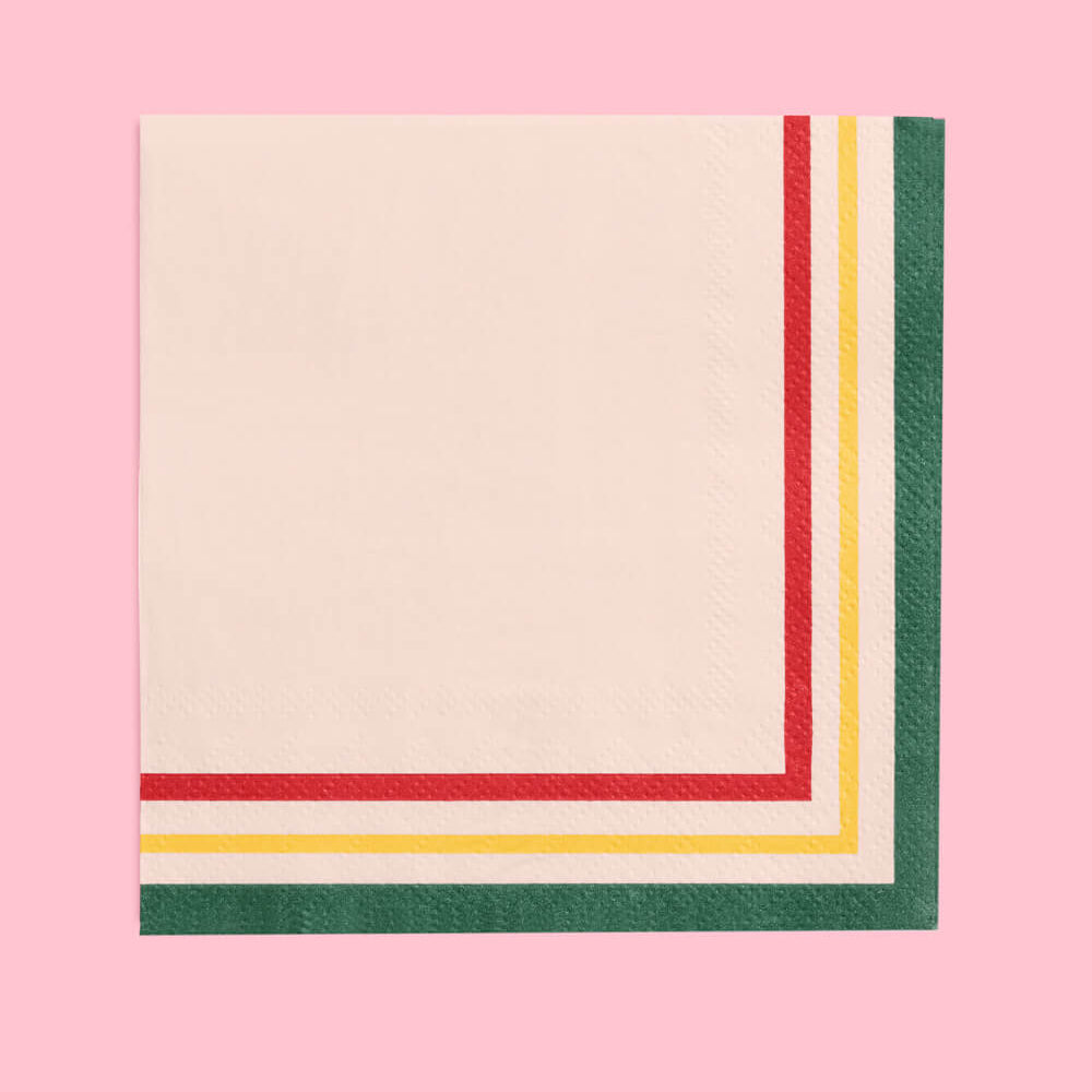 Napkin with colorful stripes on a pink background