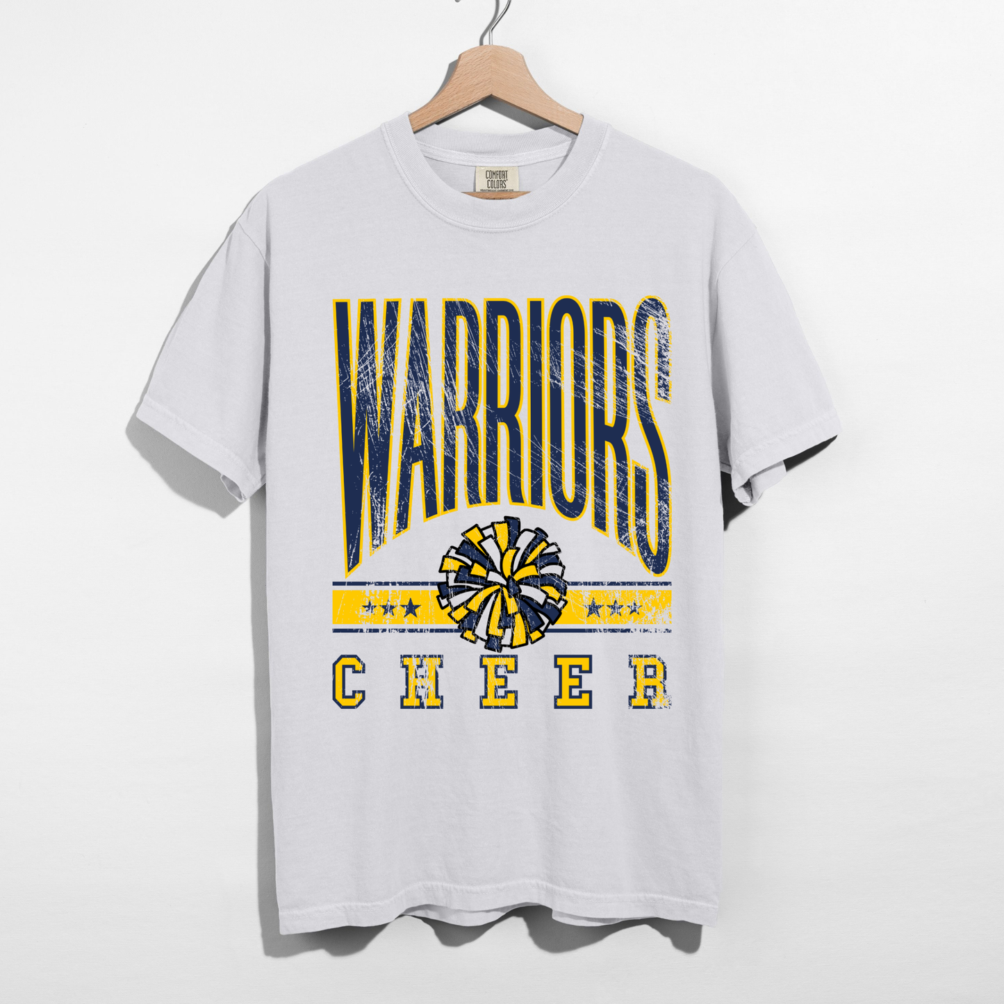 White Warriors Cheer unisex graphic t shirt with pom cheer design displayed on hanger