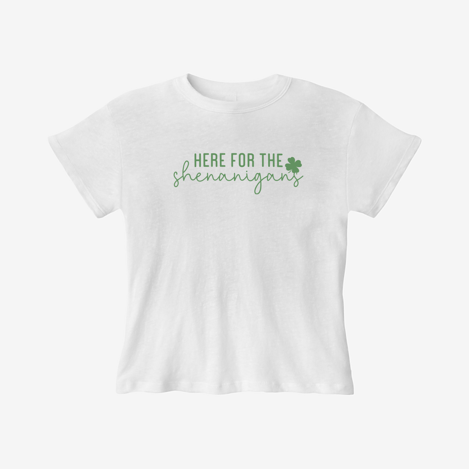 White fitted Here for the Shenanigans St Patrick’s Day baby tee with green clover graphic