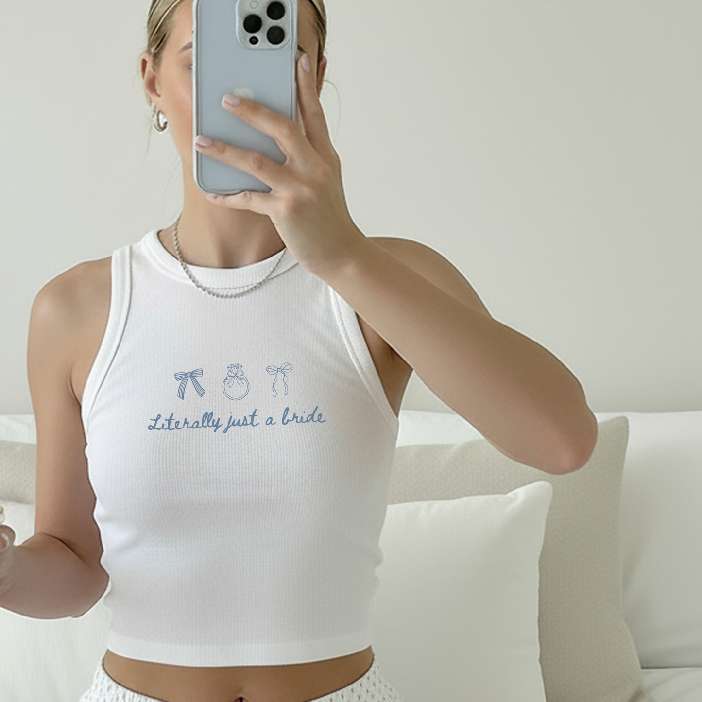Close-up of bridal lounge tank with ribbed fabric and subtle wedding icons