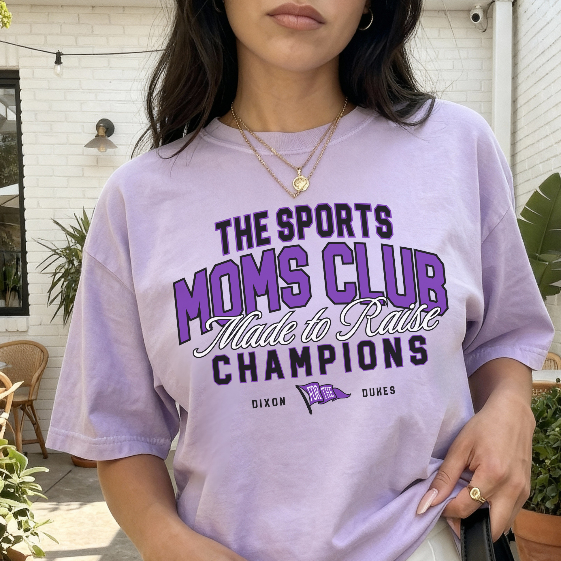 Orchid purple Sports Moms Club tee close-up showing graphic detail and fabric texture