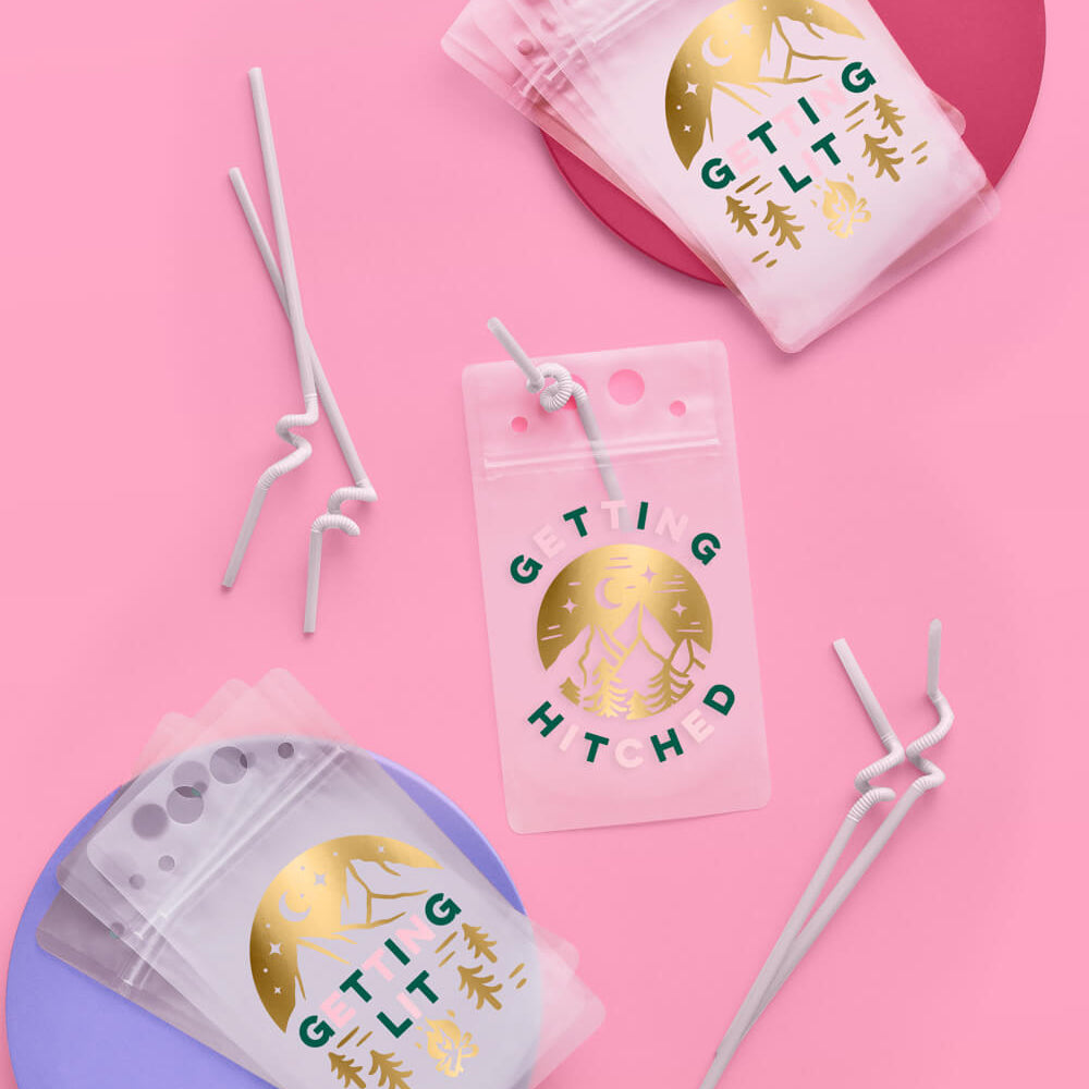 Camp Bride Getting Lit and Getting Hitched drink pouches with white curly straws