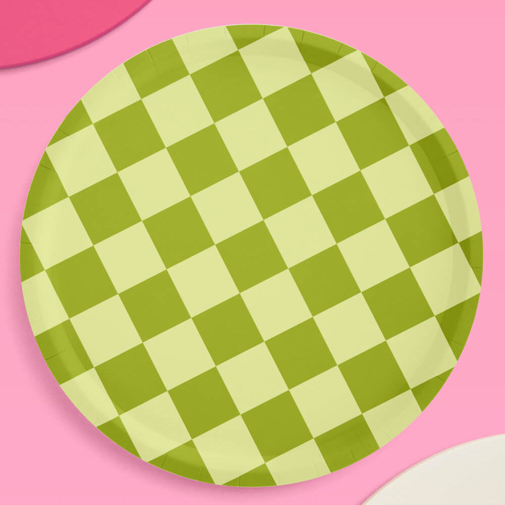 Green checkered plate on a pink background