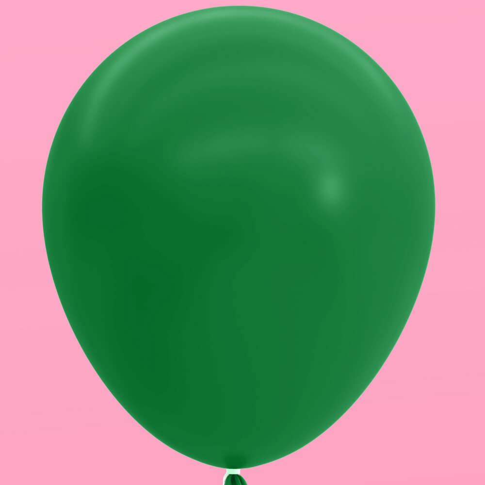 Green balloon on a pink background