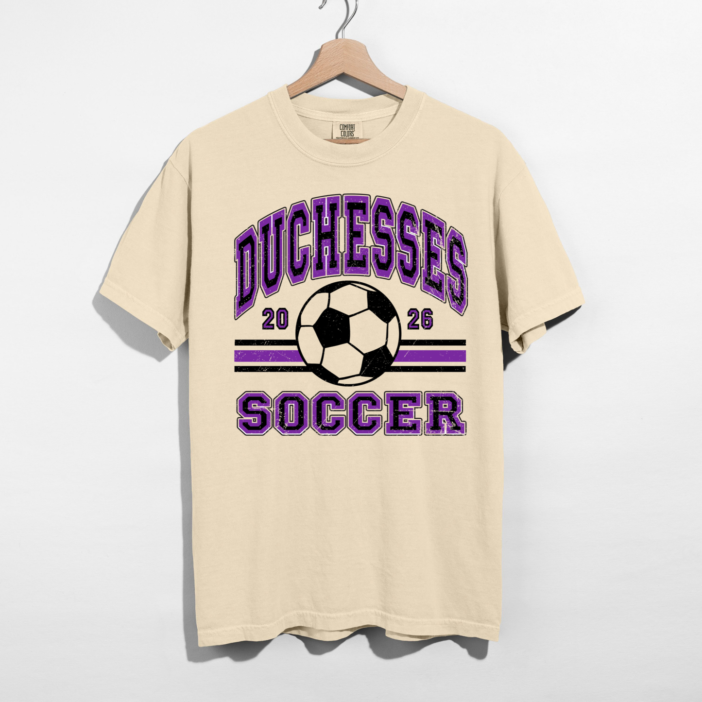Ivory Duchesses Soccer 2026 shirt with purple black distressed varsity design