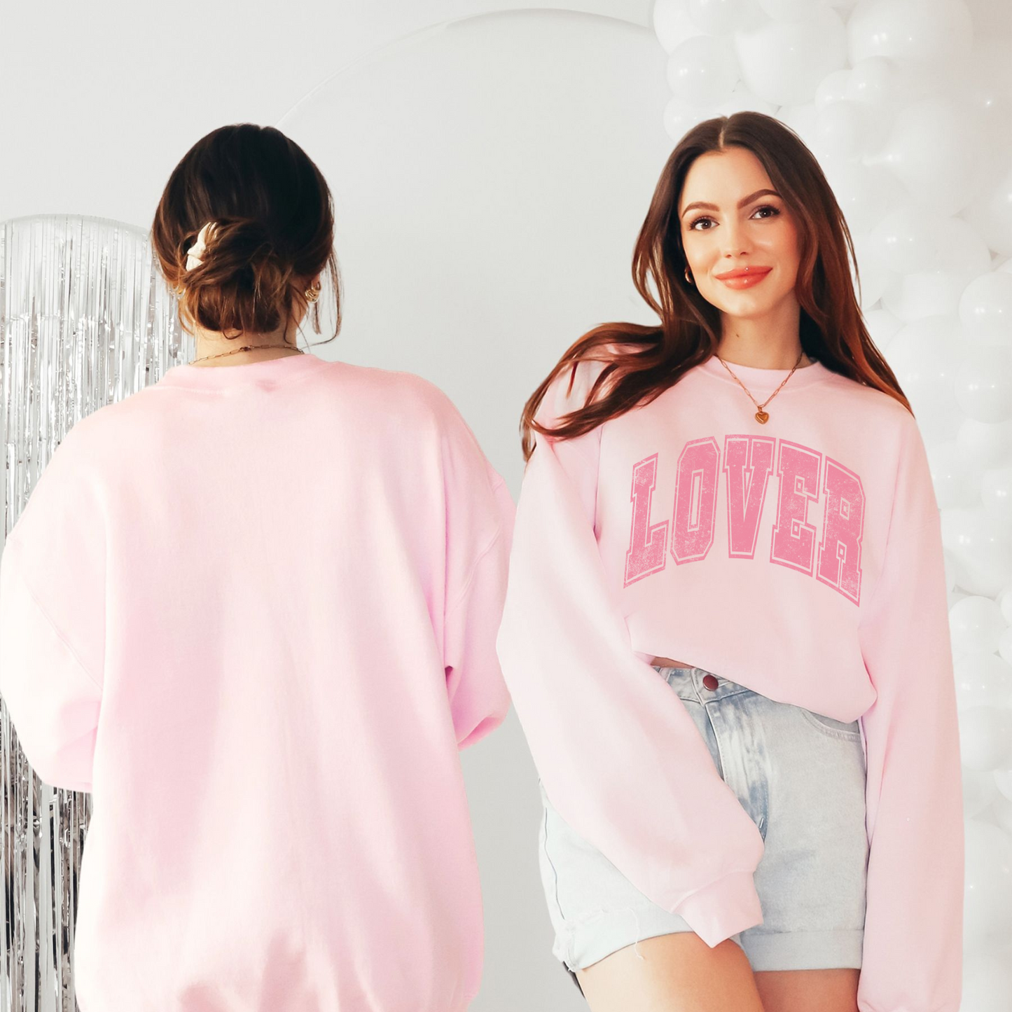 Back view of oversized pink LOVER sweatshirt showing relaxed unisex fit