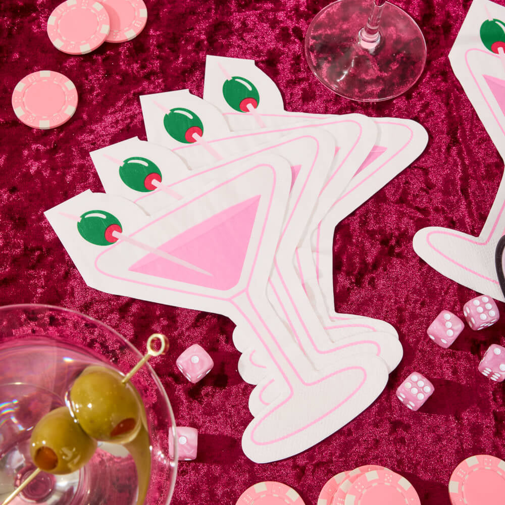 Martini themed party napkins styled with cocktail glass and casino themed decor for girls night
