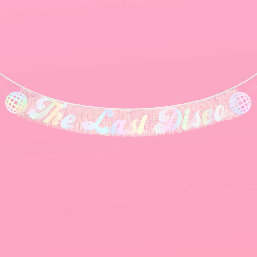 Decorative banner with 'The Last Unicorn' text on a pink background