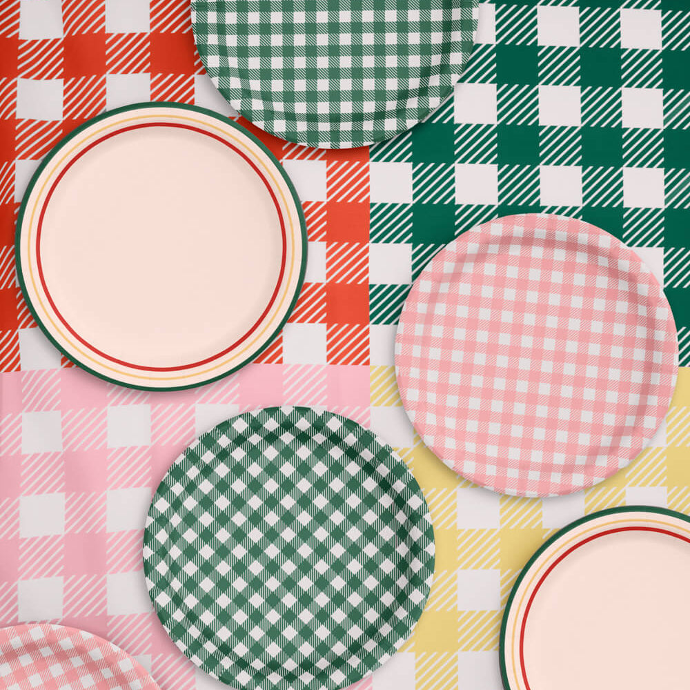 Assorted checkered plates on a patterned tablecloth
