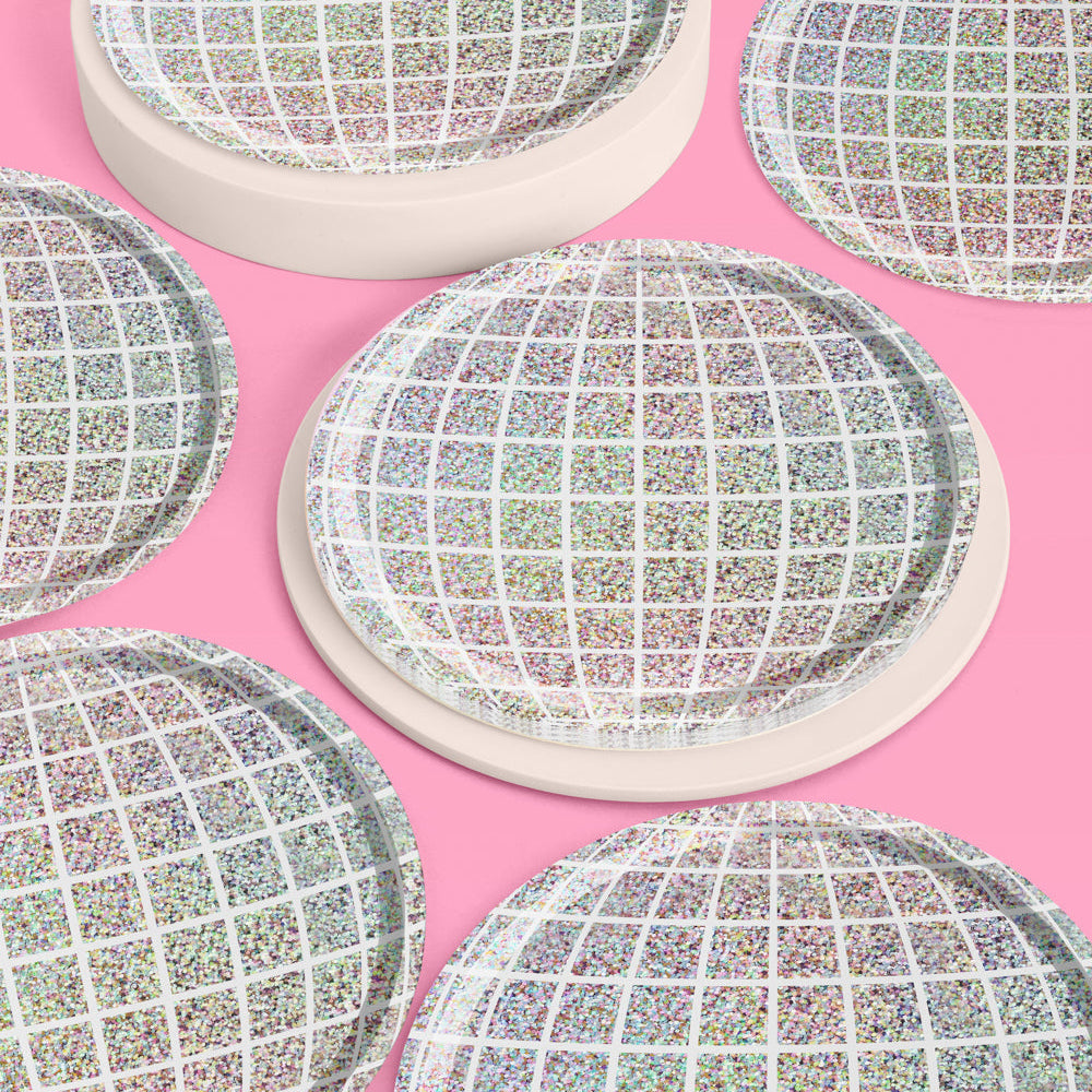 Round textured plates on a pink background