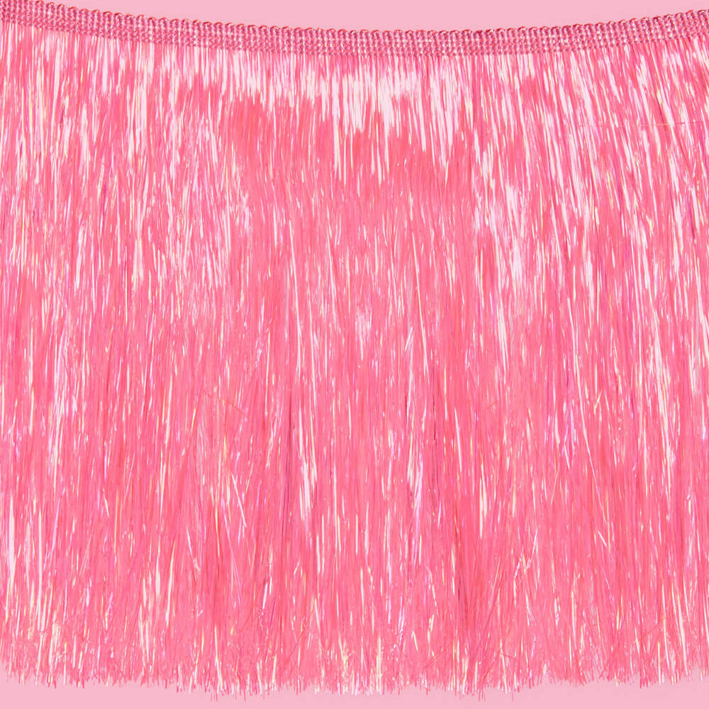 Pink tinsel fringe on a pink background