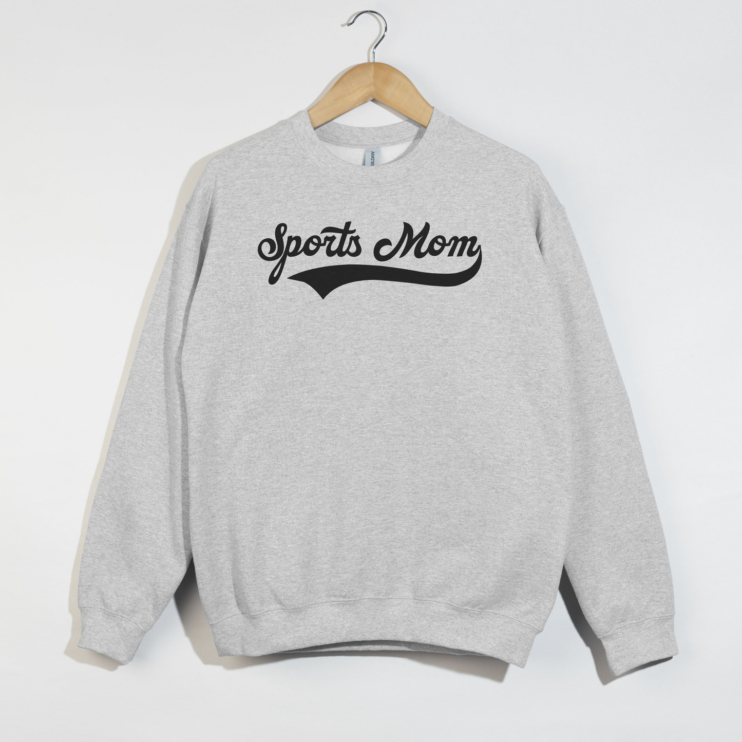 Gray sweatshirt with 'Sports Mom' text on a white background