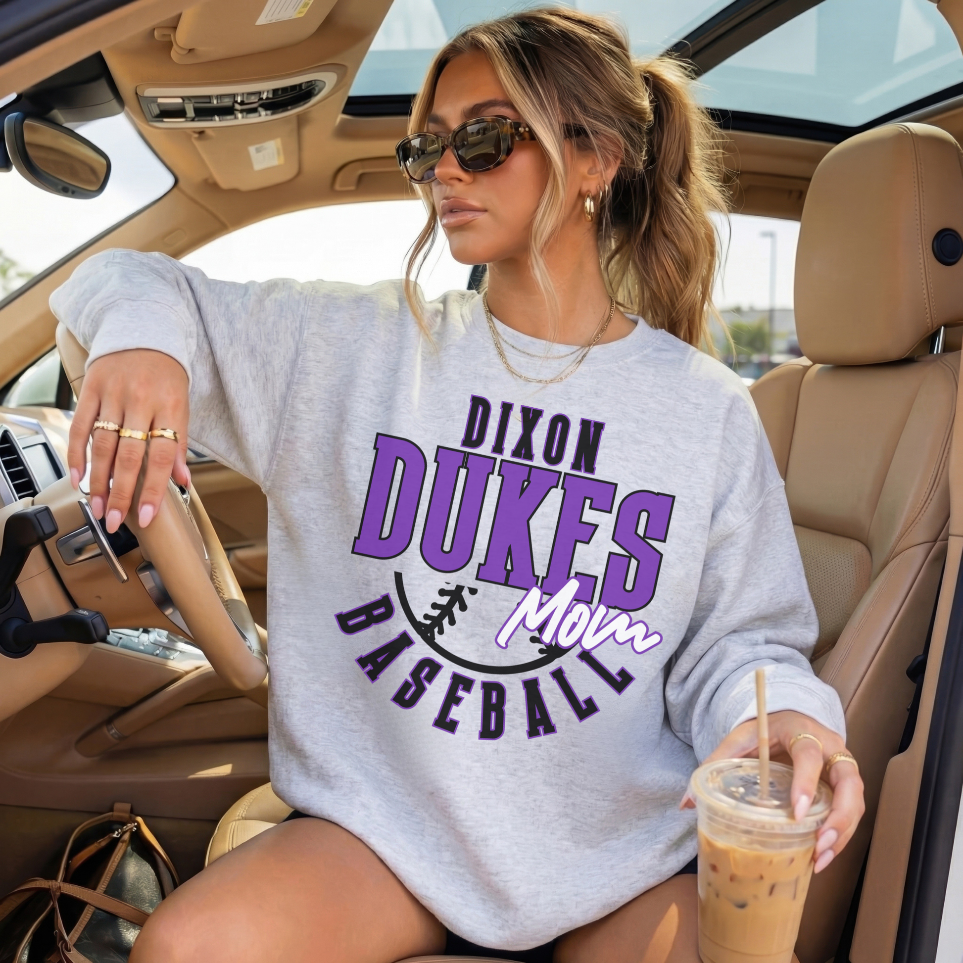 Ash grey Dixon Dukes Baseball Mom crewneck sweatshirt styled in car with sunglasses lifestyle image