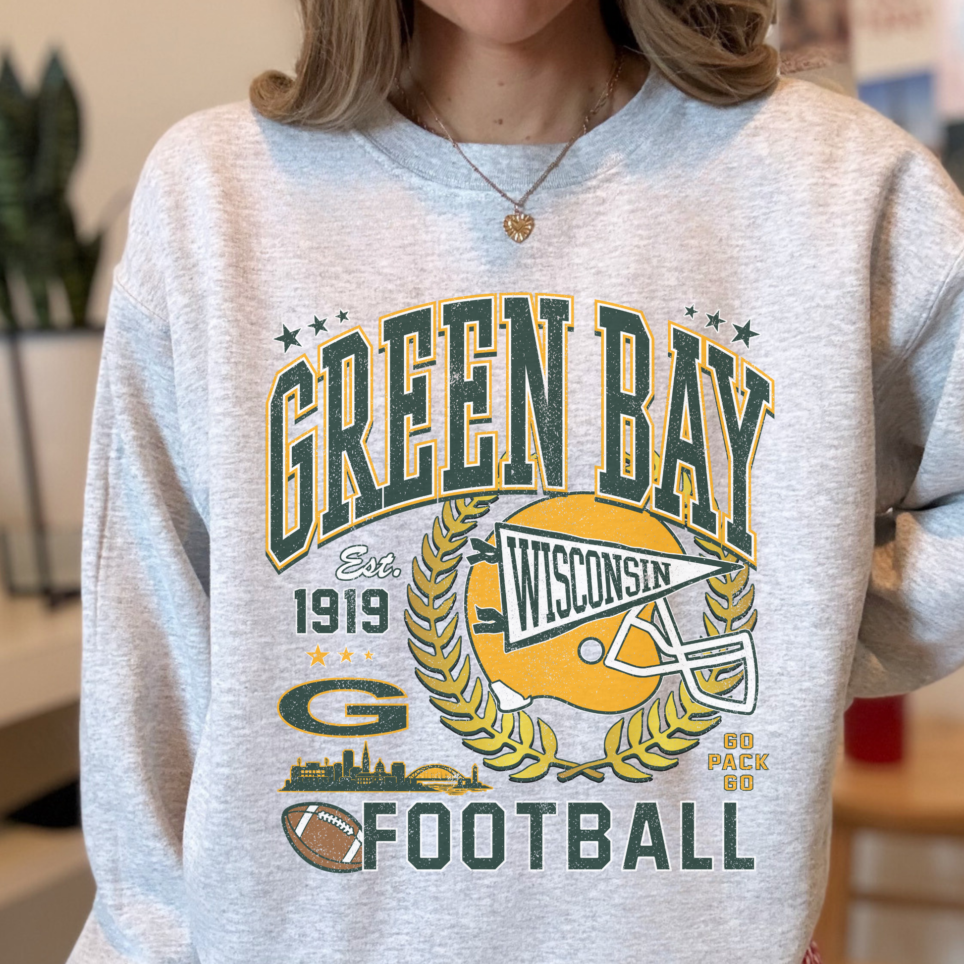 Green Bay football sweatshirt worn by model, vintage Wisconsin game day crewneck