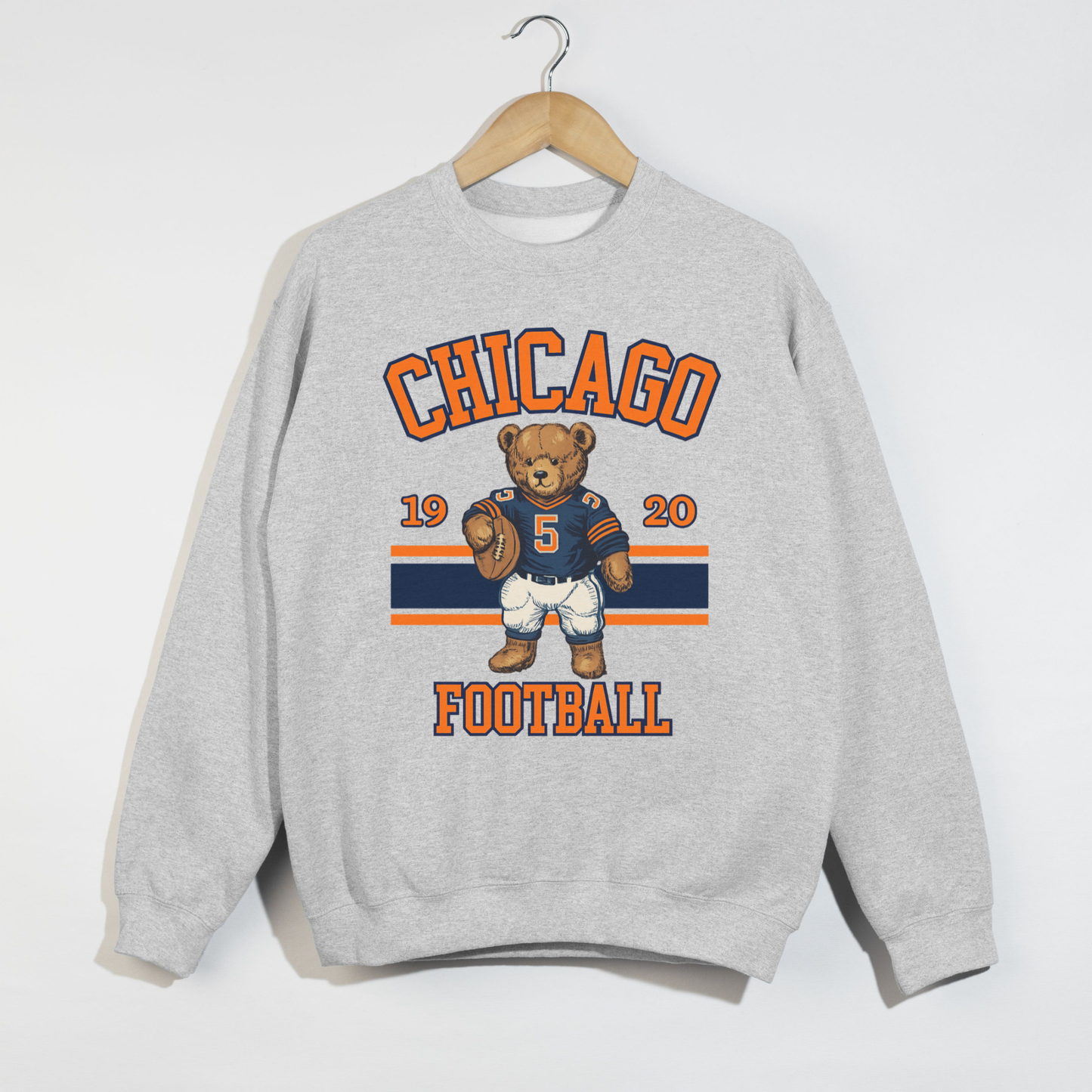 Gray sweatshirt with Chicago Football design featuring a bear and numbers on a white background