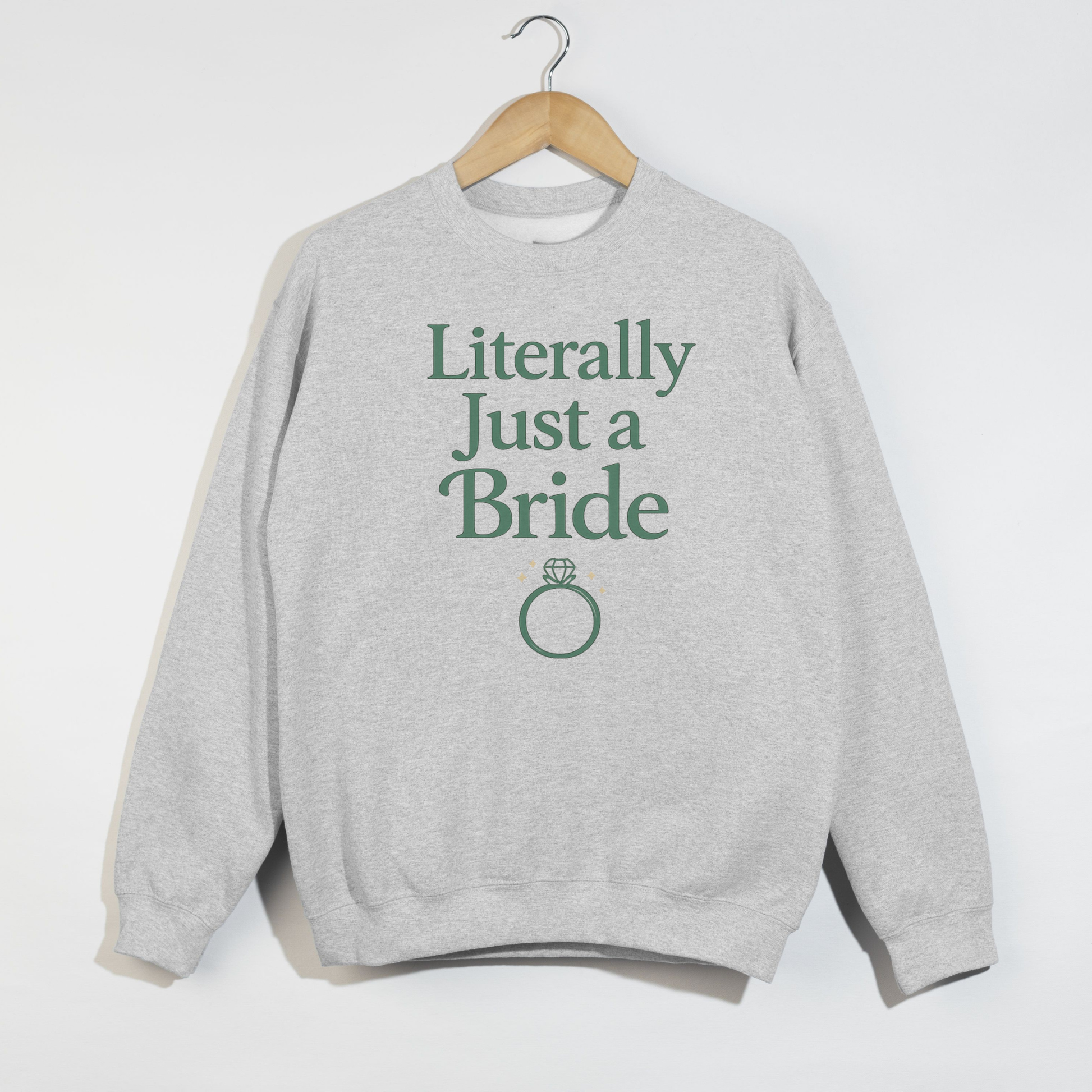 Ash grey Literally Just a Bride crewneck sweatshirt on hanger