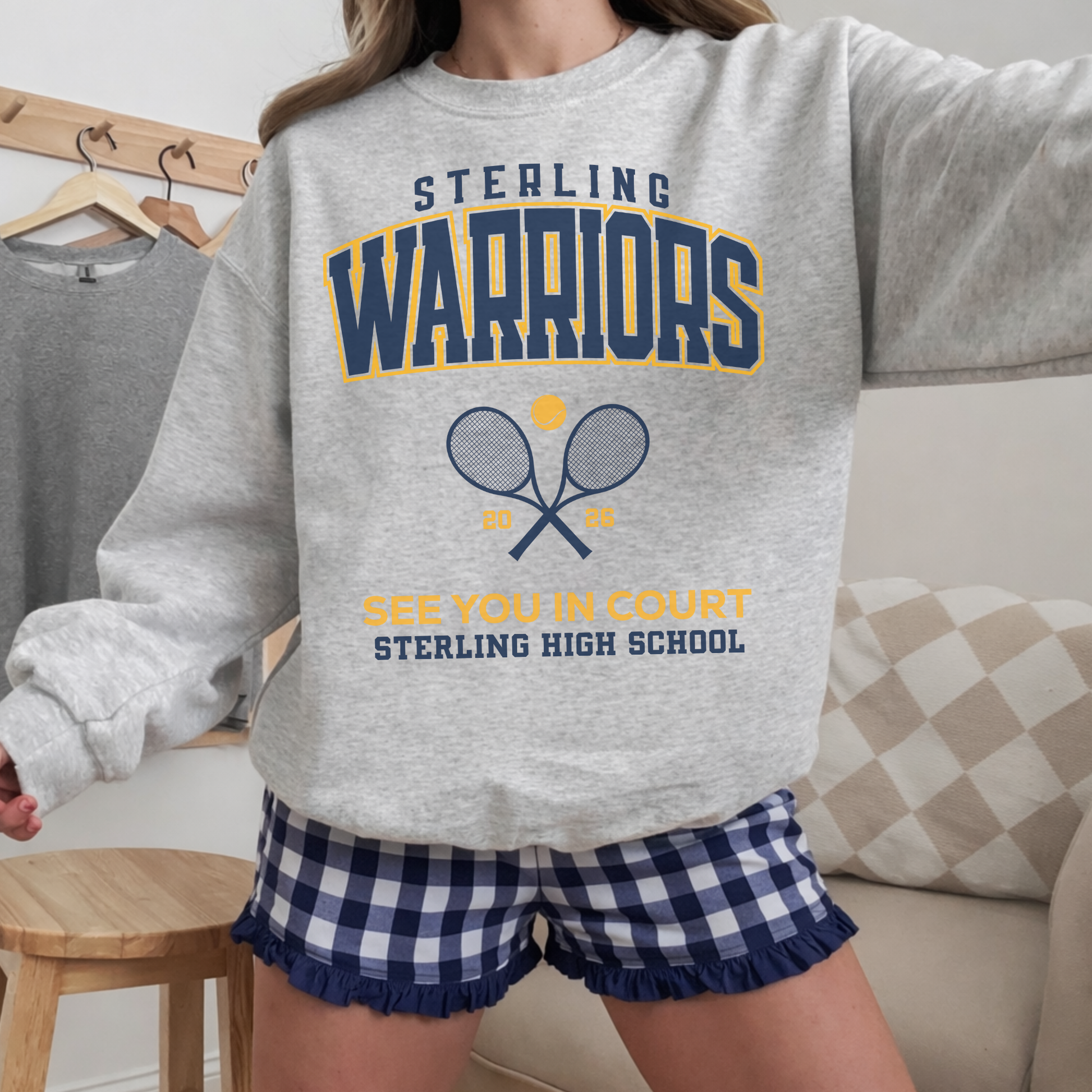 Ash grey Sterling Warriors Tennis crewneck sweatshirt with bold school spirit graphic