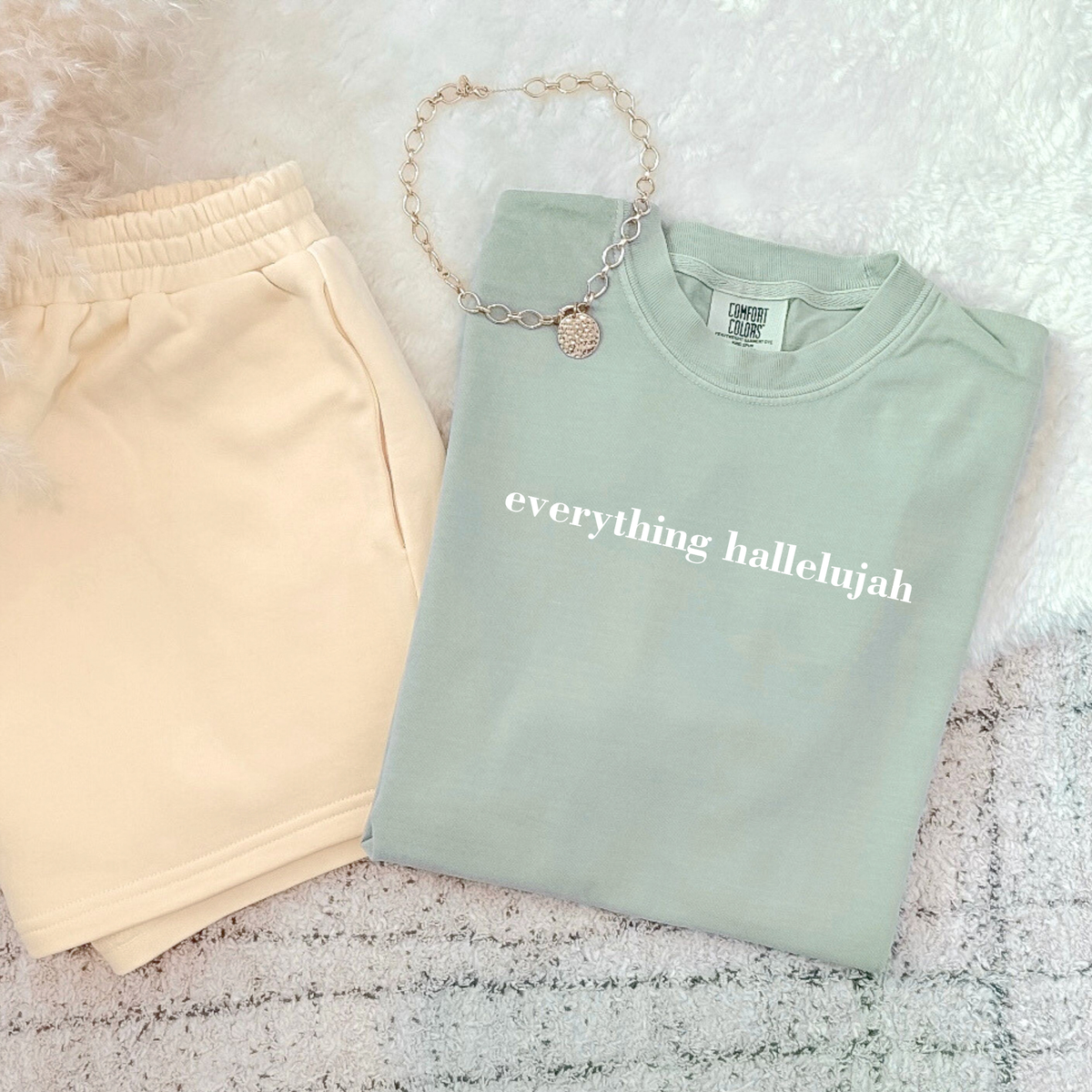 Bay green Everything Hallelujah faith inspired graphic t-shirt with minimalist white text