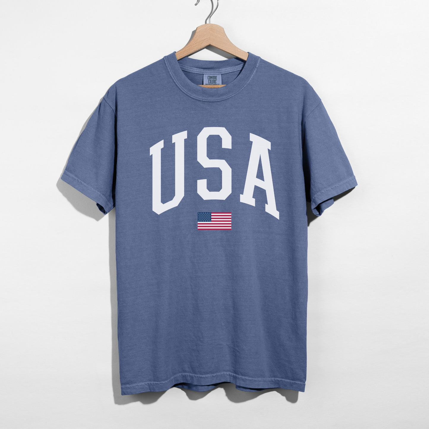 Blue jean garment dyed USA graphic tee with white varsity letters classic americana shirt