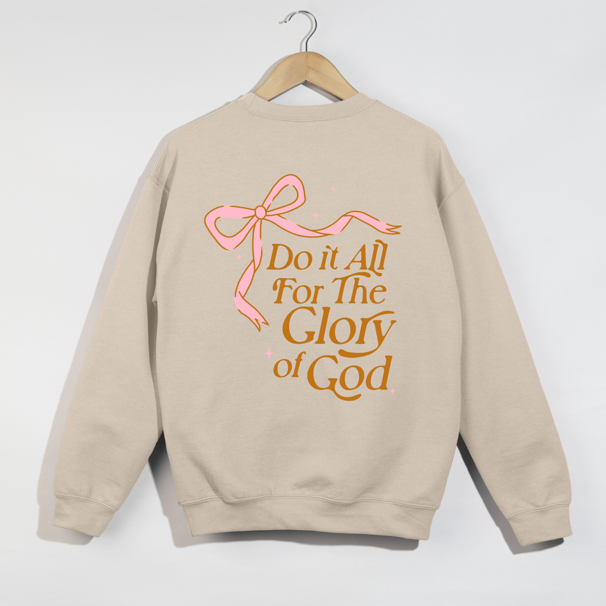 Bone Christian crewneck sweatshirt with pink bow and scripture 1 Corinthians 10:23 — American Apparel RF496