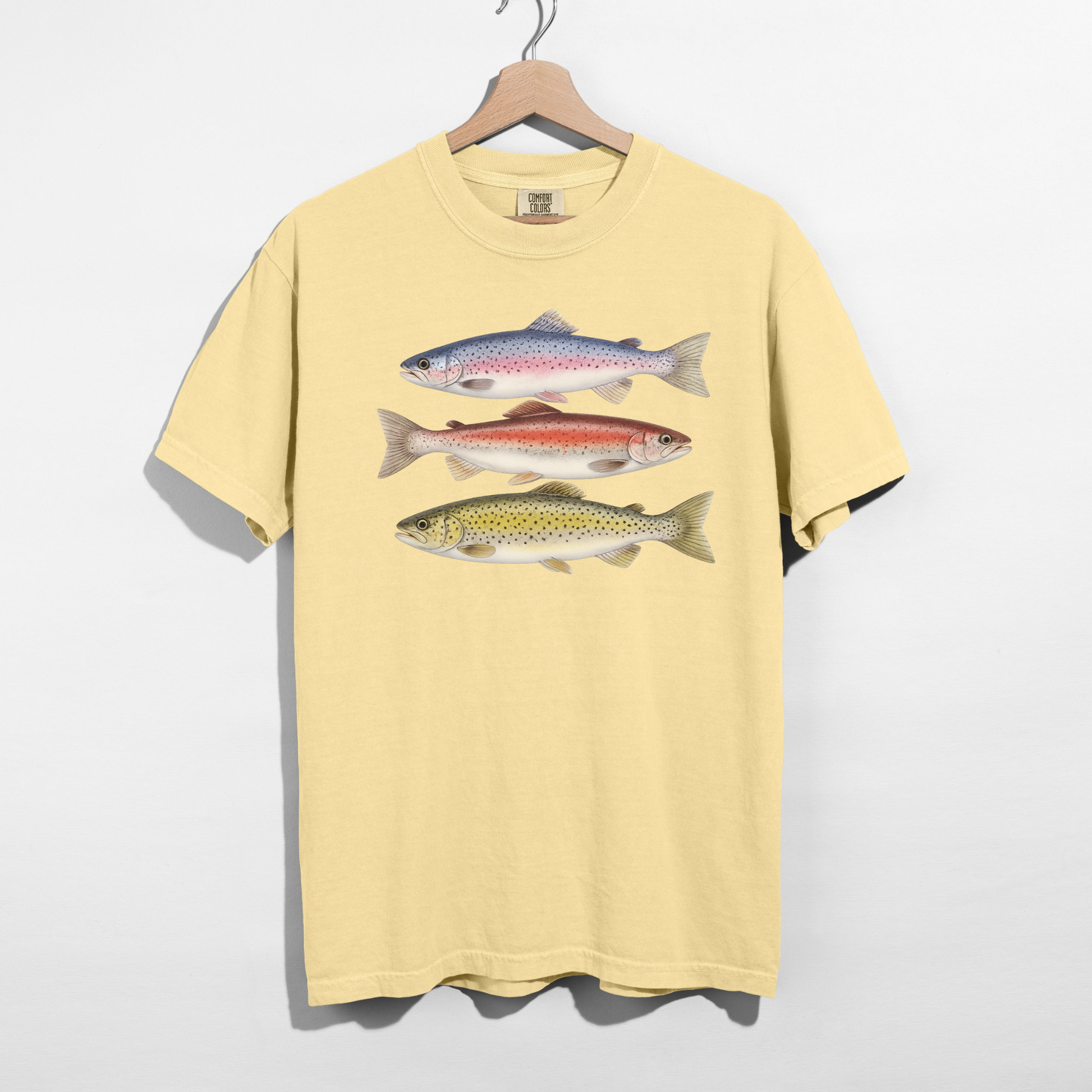 Butter yellow fishing graphic tee featuring realistic freshwater trout illustrations