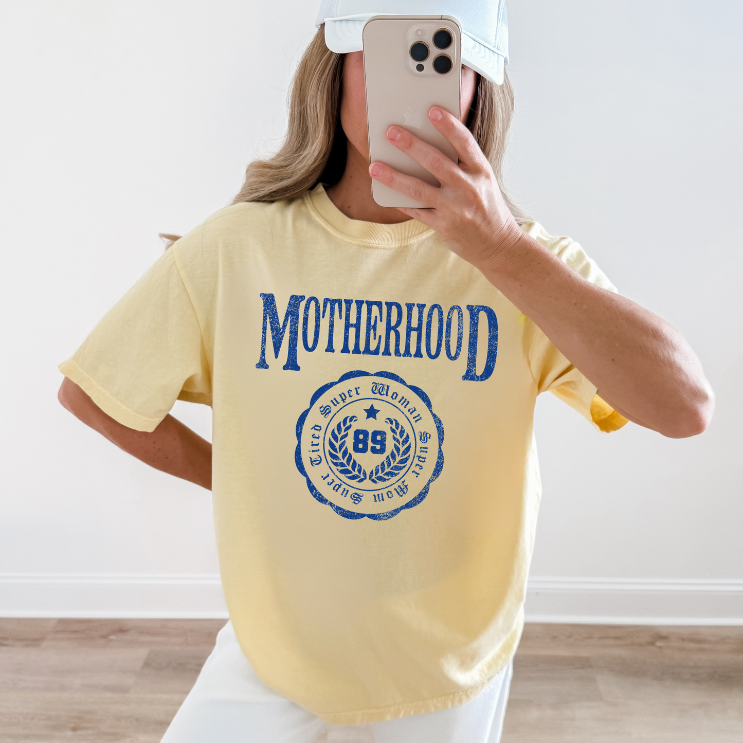 woman wearing motherhood graphic tee vintage mom shirt yellow casual outfit