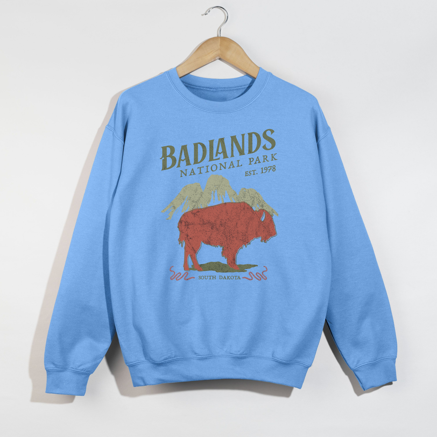 Carolina blue unisex crewneck sweatshirt with national park buffalo illustration