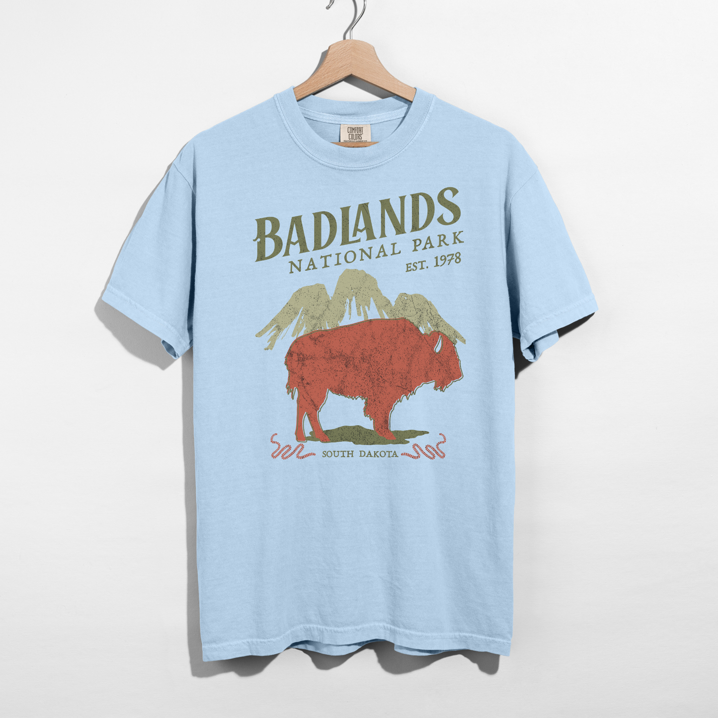 Chambray blue Badlands National Park graphic tee with retro bison and mountain design