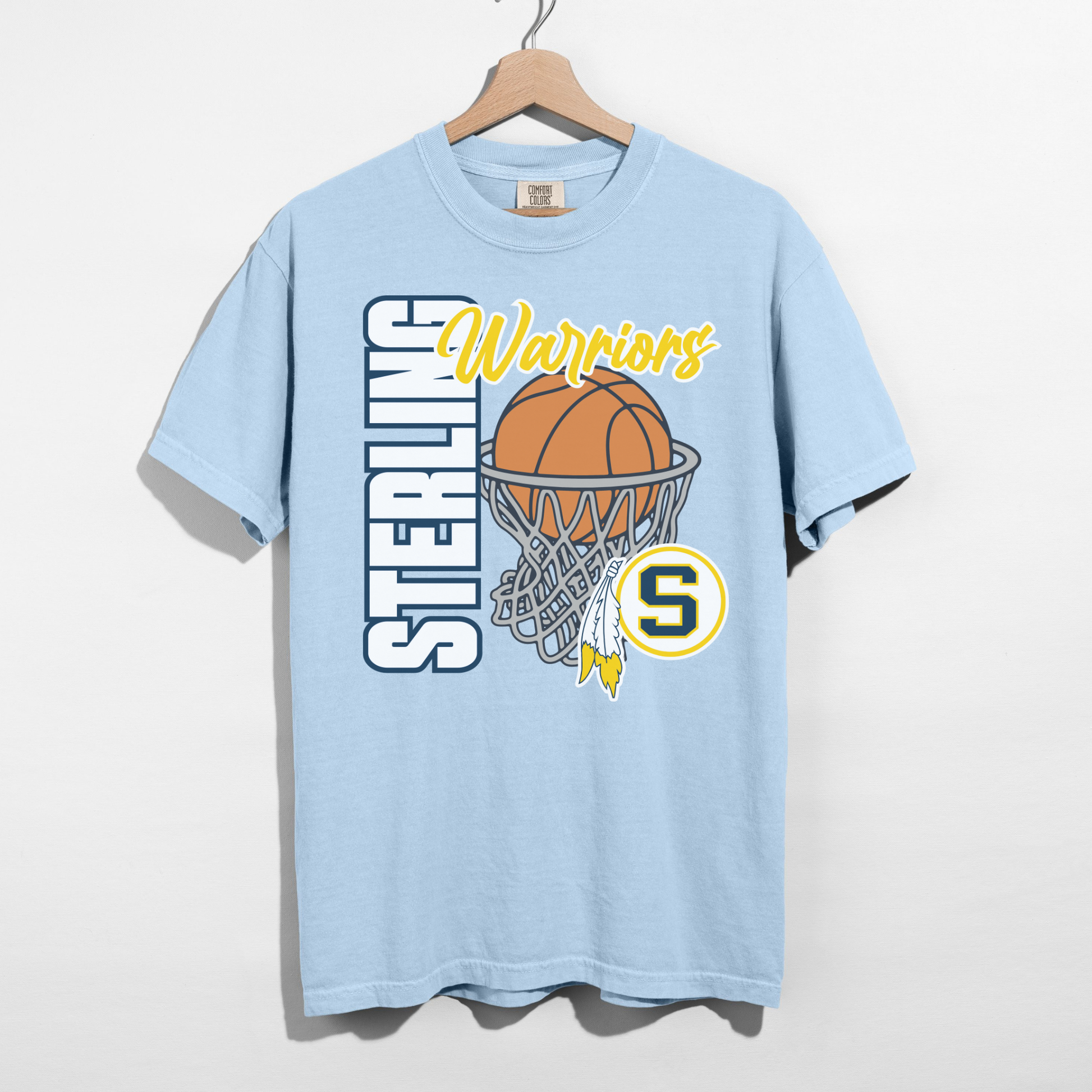 Light blue t-shirt with basketball graphics and text on a white background