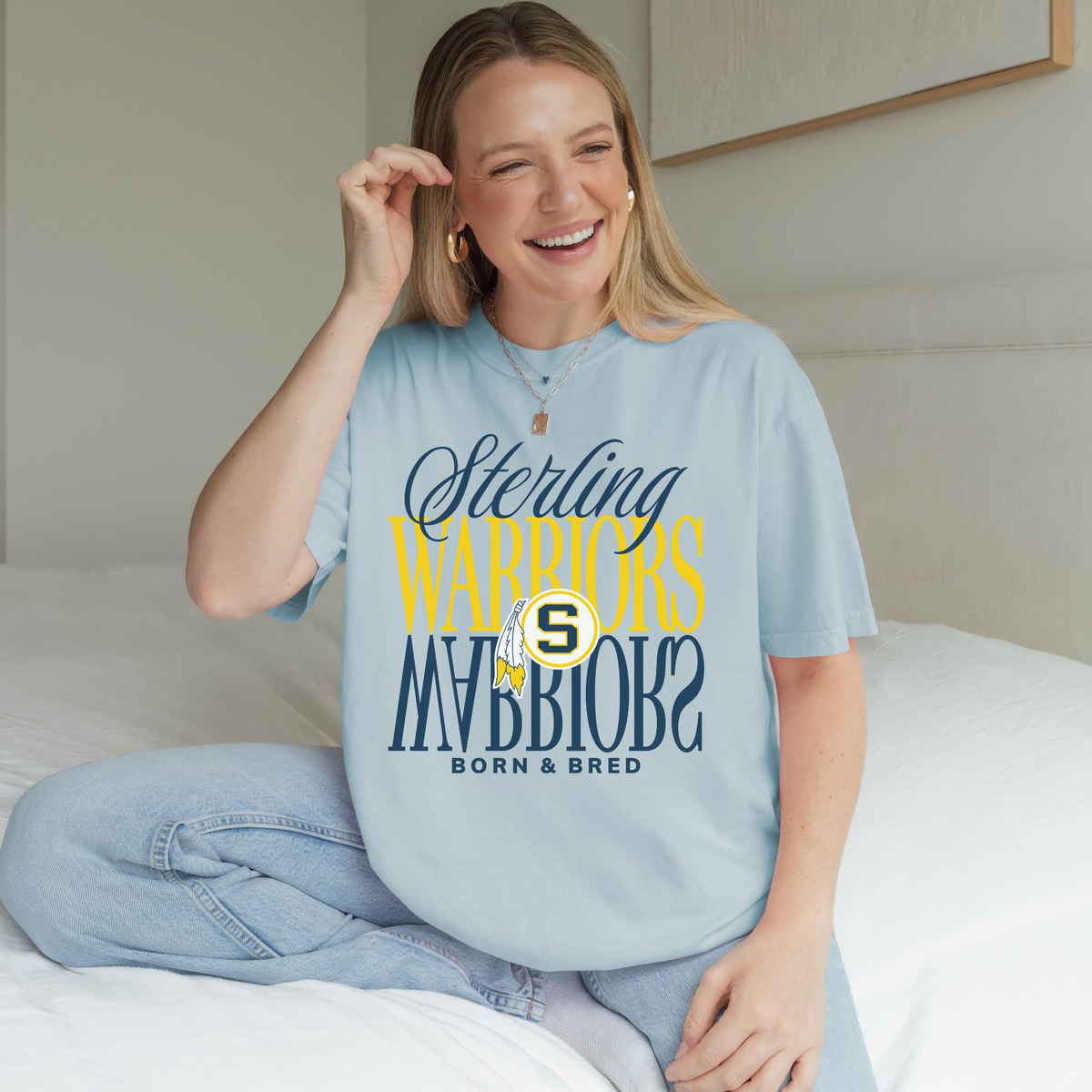 Chambray Sterling Warriors Born and Bred unisex shirt styled casually with jeans