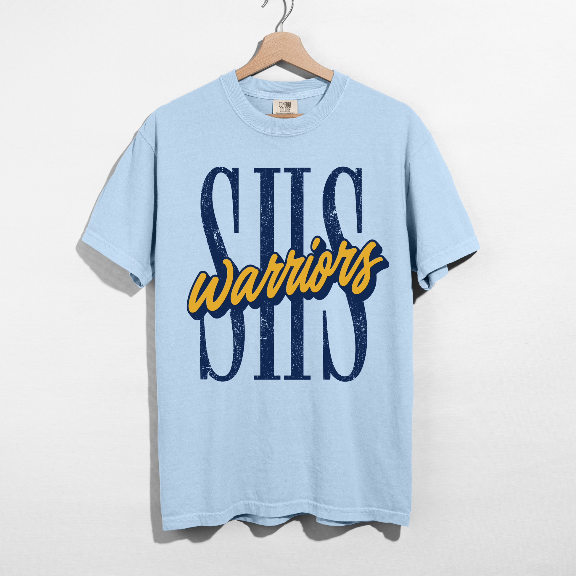 Chambray blue SHS Warriors graphic tee featuring distressed navy SHS lettering and gold Warriors script for Sterling Warriors school spirit.
