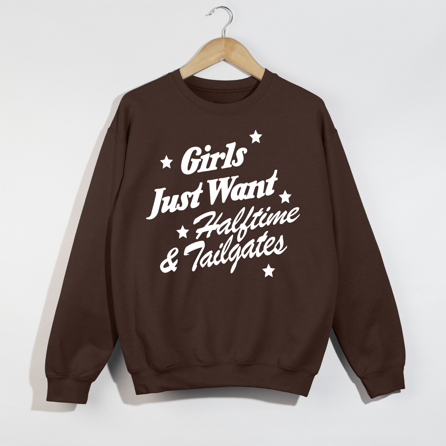 Chocolate brown football tailgate sweatshirt with retro "Girls Just Want Halftime & Tailgates" graphic in white.