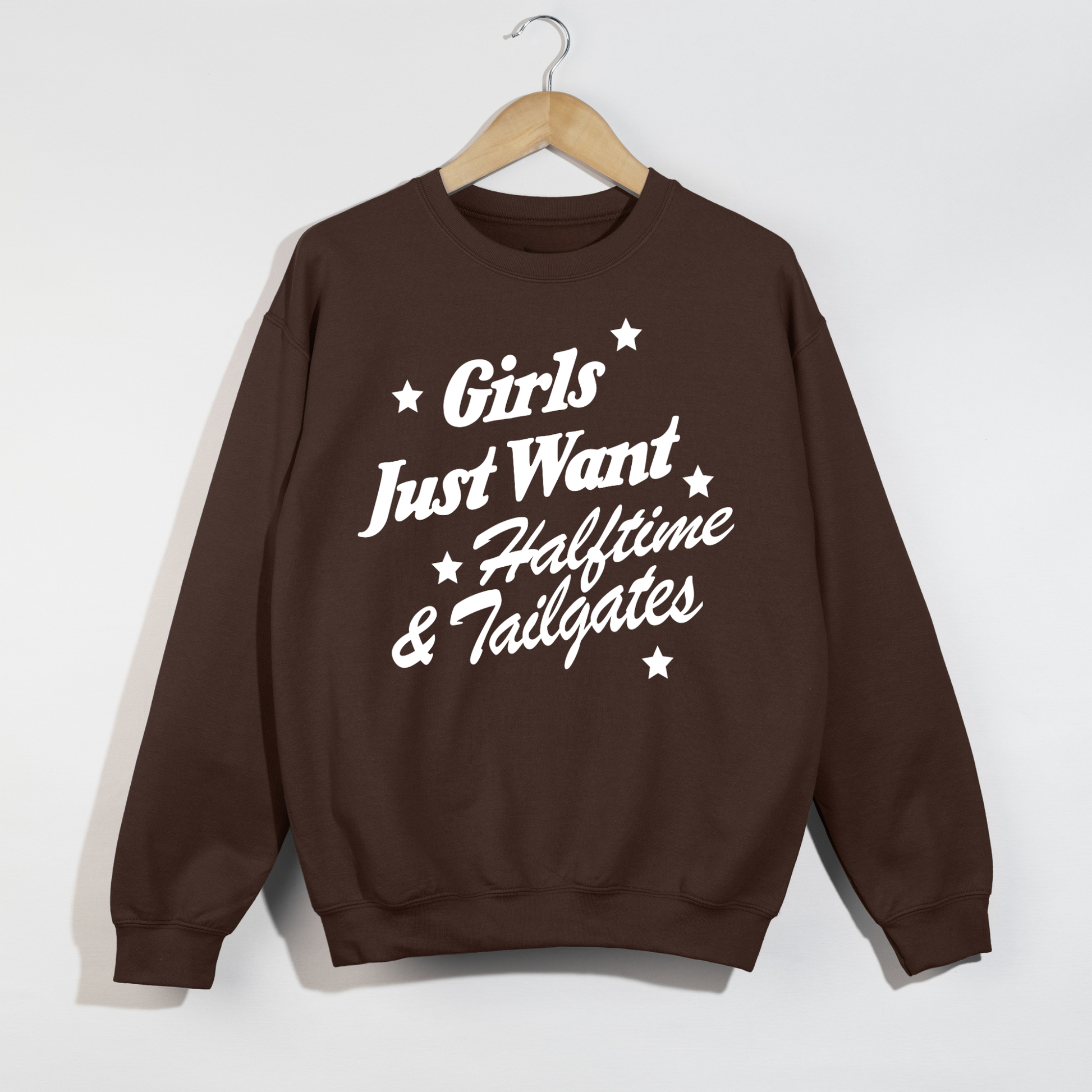 Chocolate brown football tailgate sweatshirt with retro "Girls Just Want Halftime & Tailgates" graphic in white.