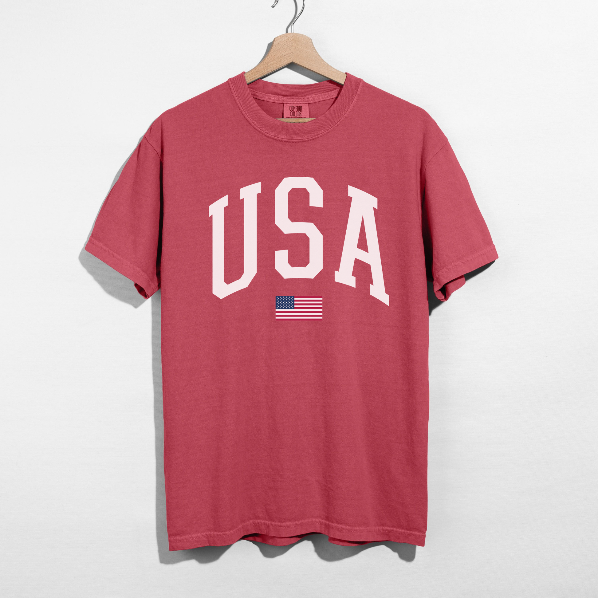 Crimson red USA varsity shirt with white collegiate lettering patriotic summer tee