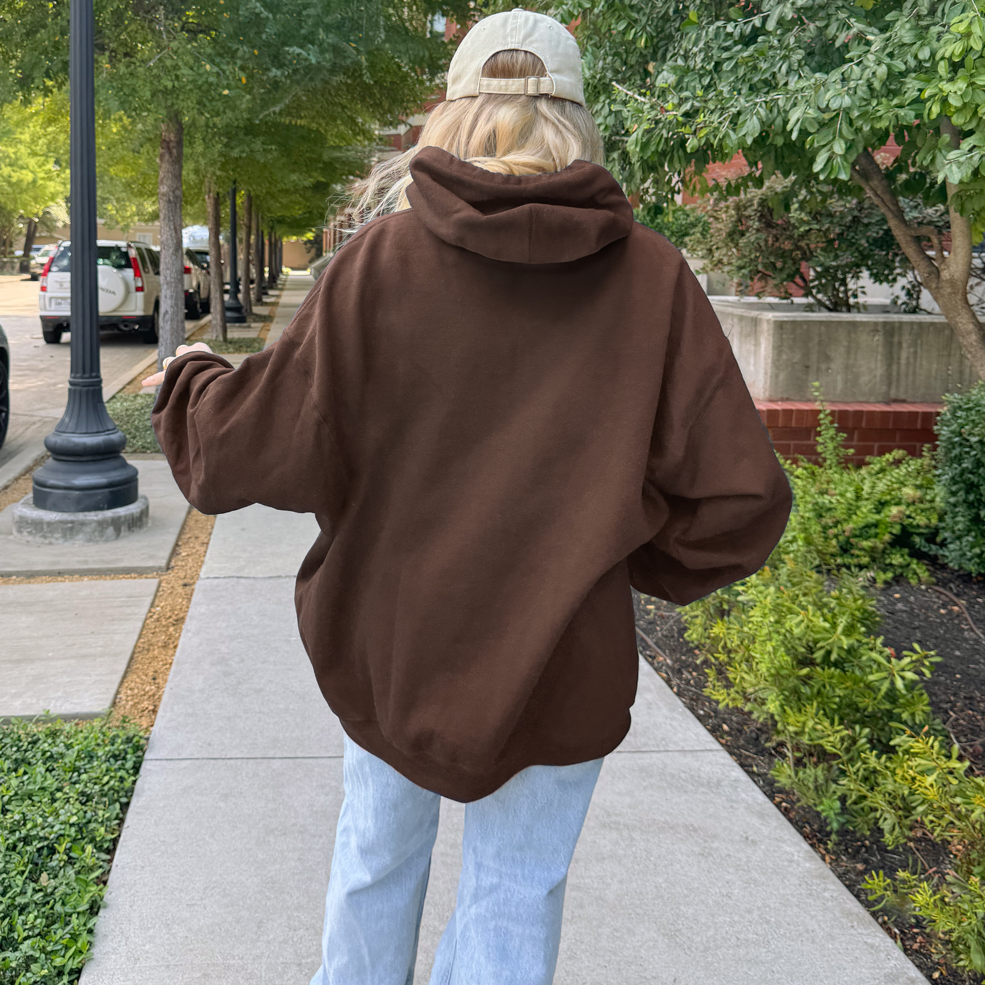 Back view of PRAY faith hoodie showing oversized cozy silhouette