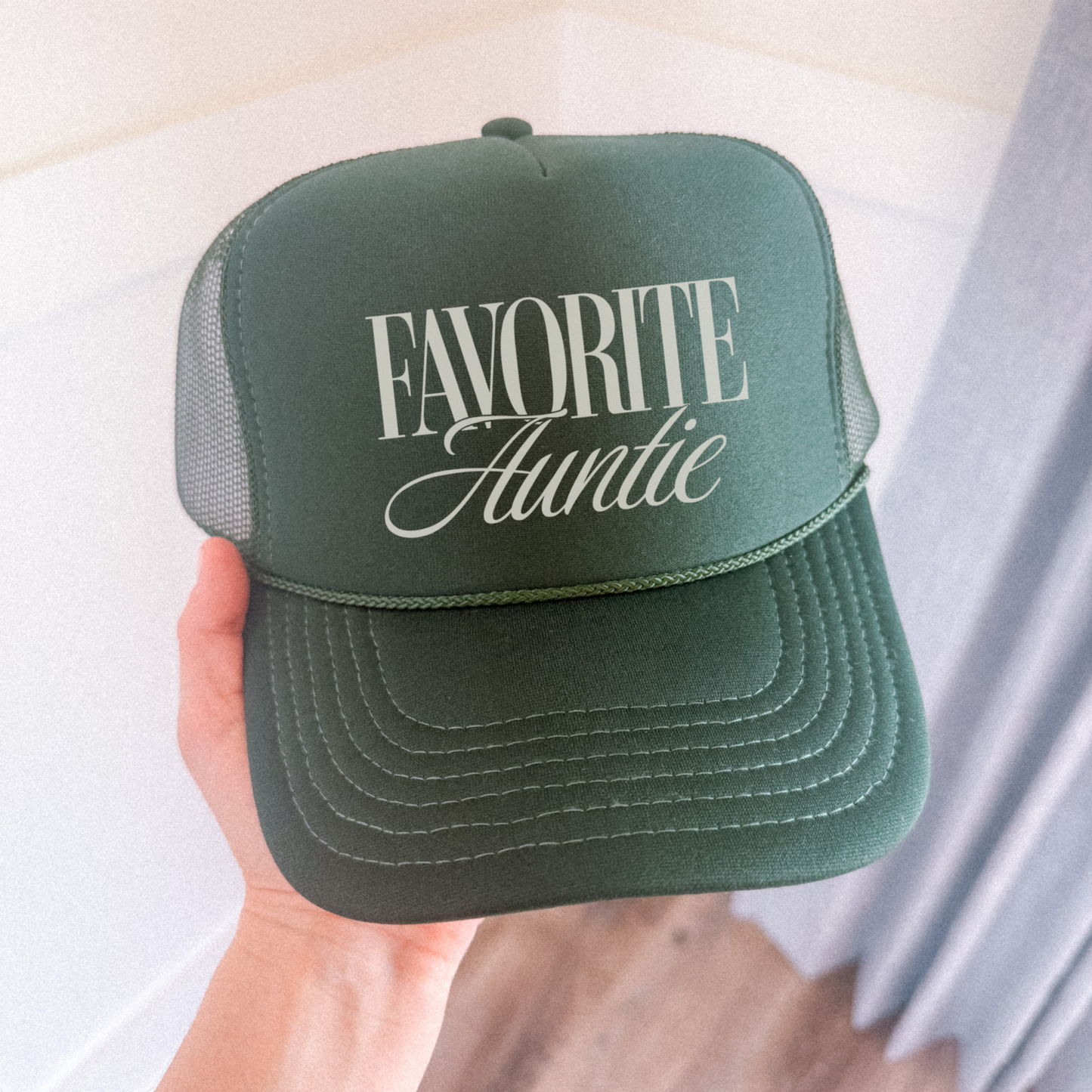 Green Favorite Auntie trucker hat close up front view