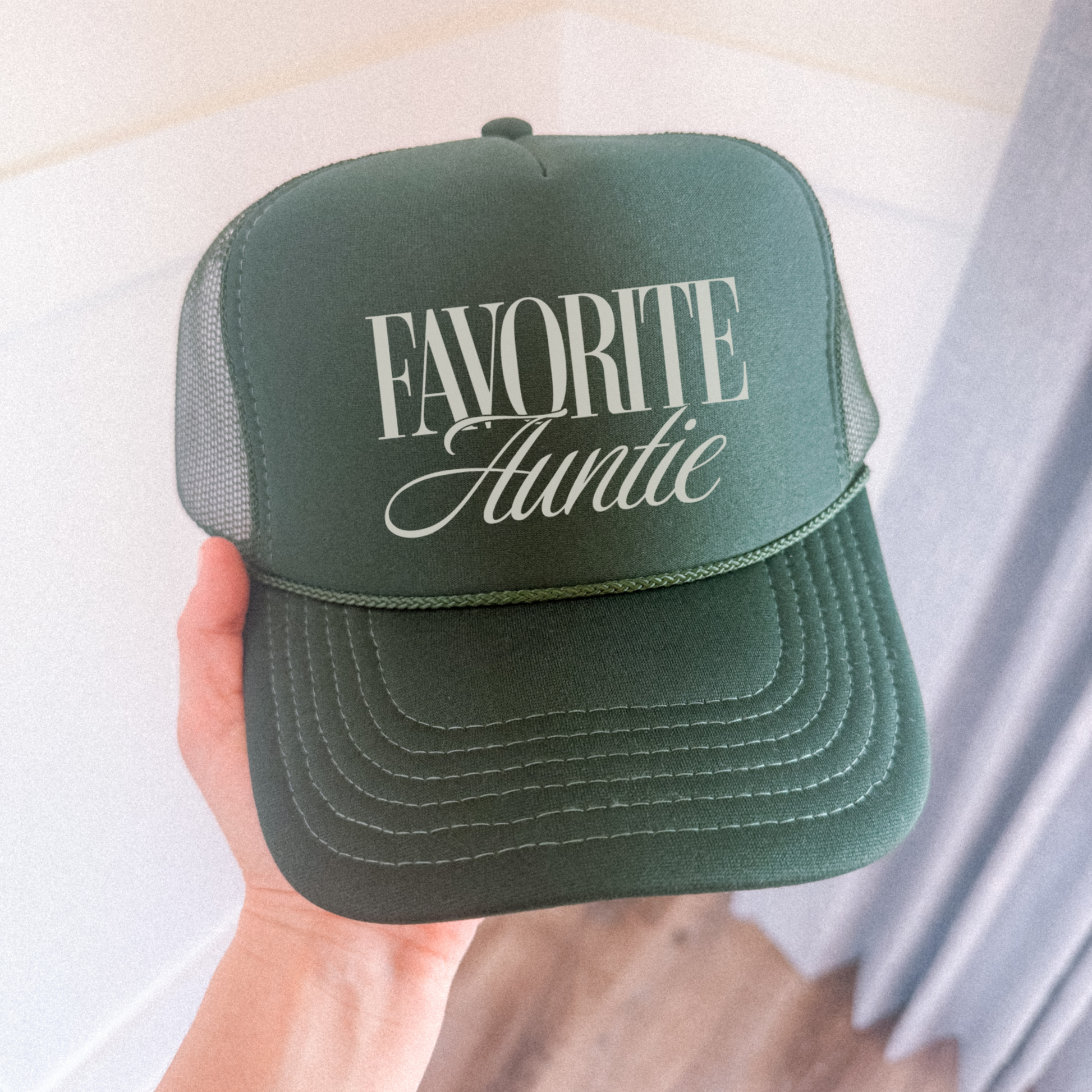 Green Favorite Auntie trucker hat close up front view