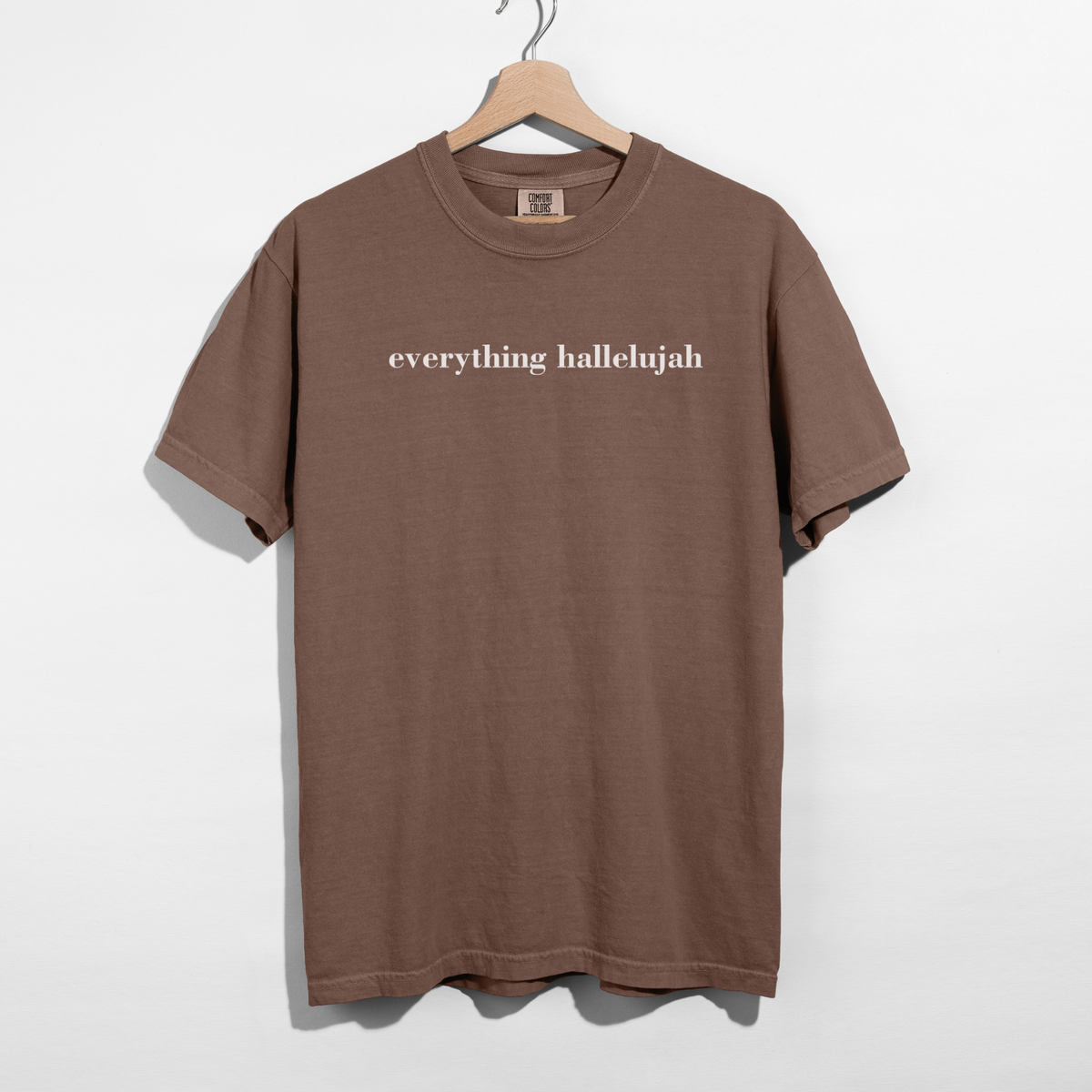 Espresso brown Everything Hallelujah minimalist Christian graphic t-shirt with white lettering