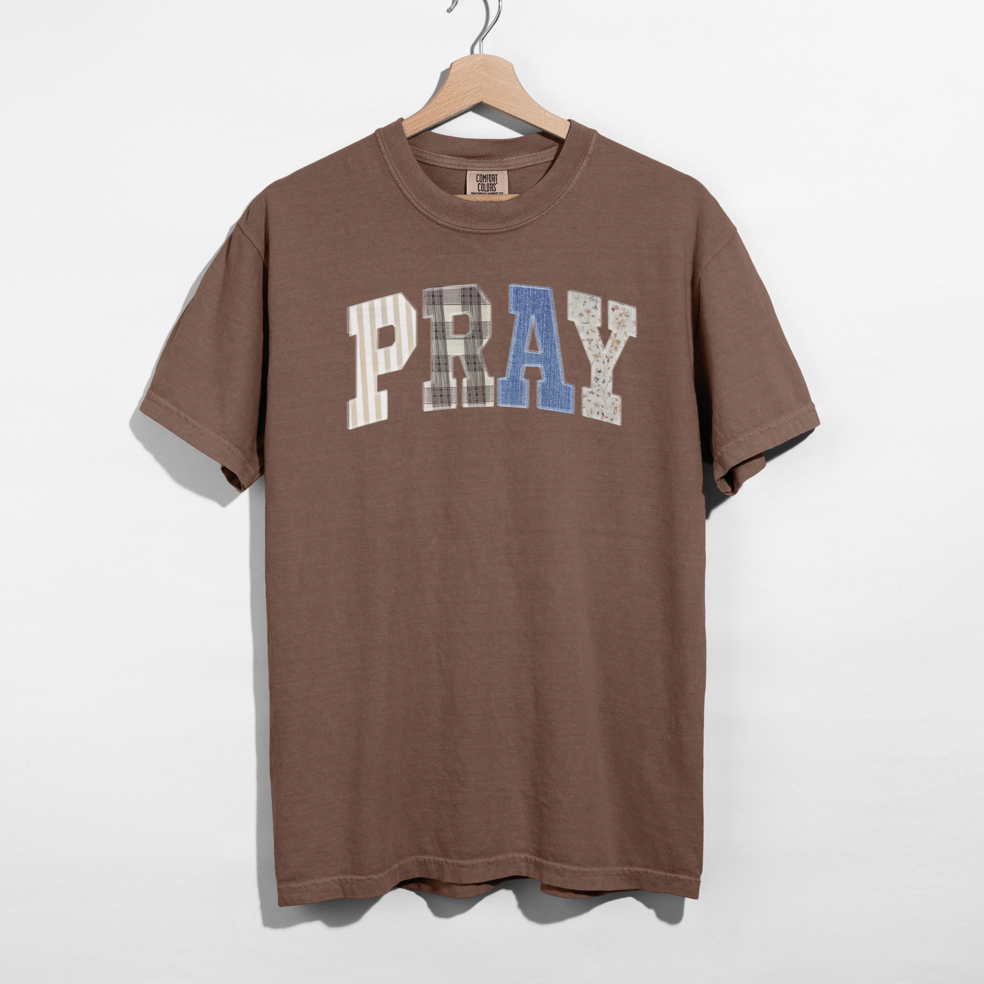 Brown Comfort Colors PRAY faith graphic tee with faux patchwork lettering