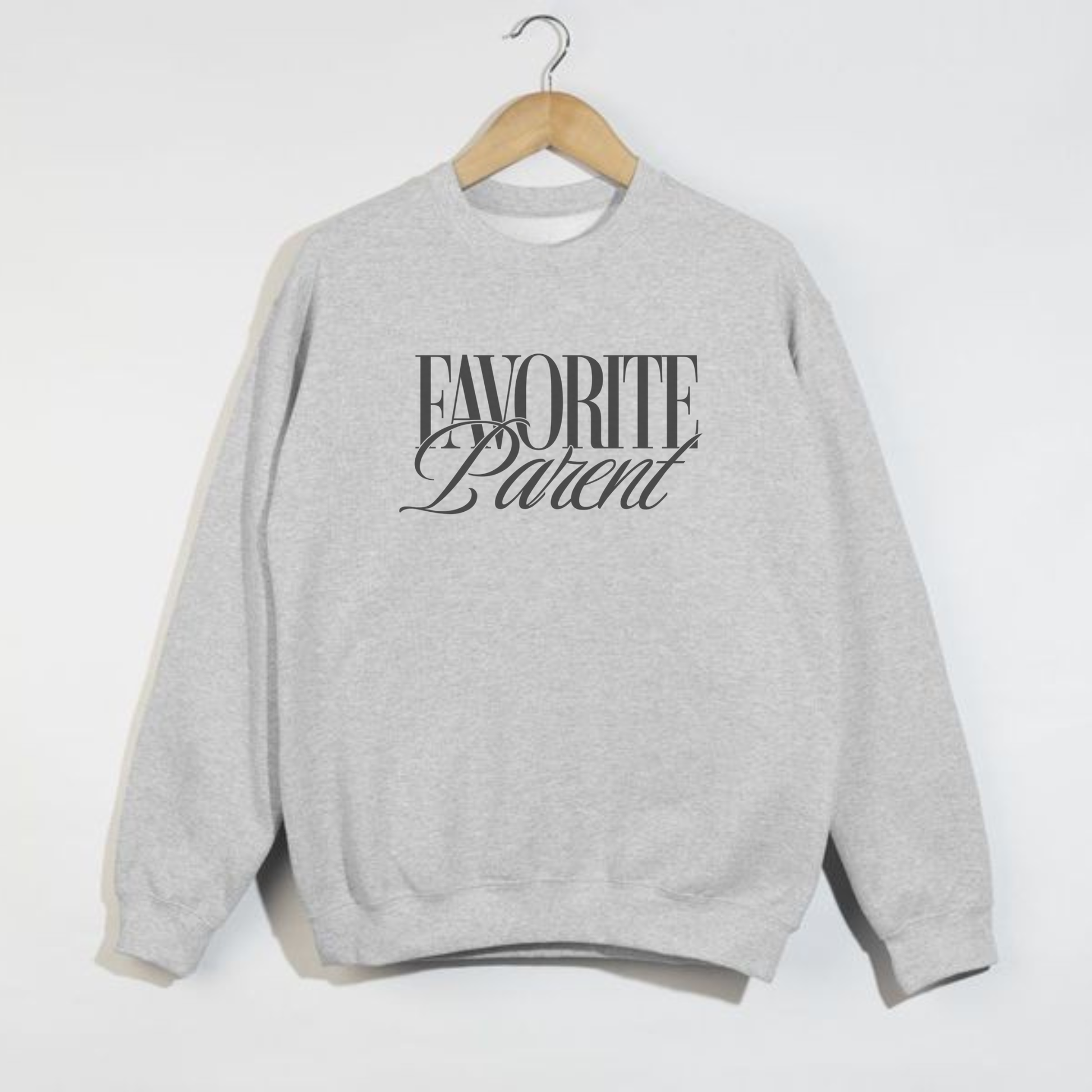 Ash grey Favorite Parent sweatshirt with black text hanging on wooden hanger against white background