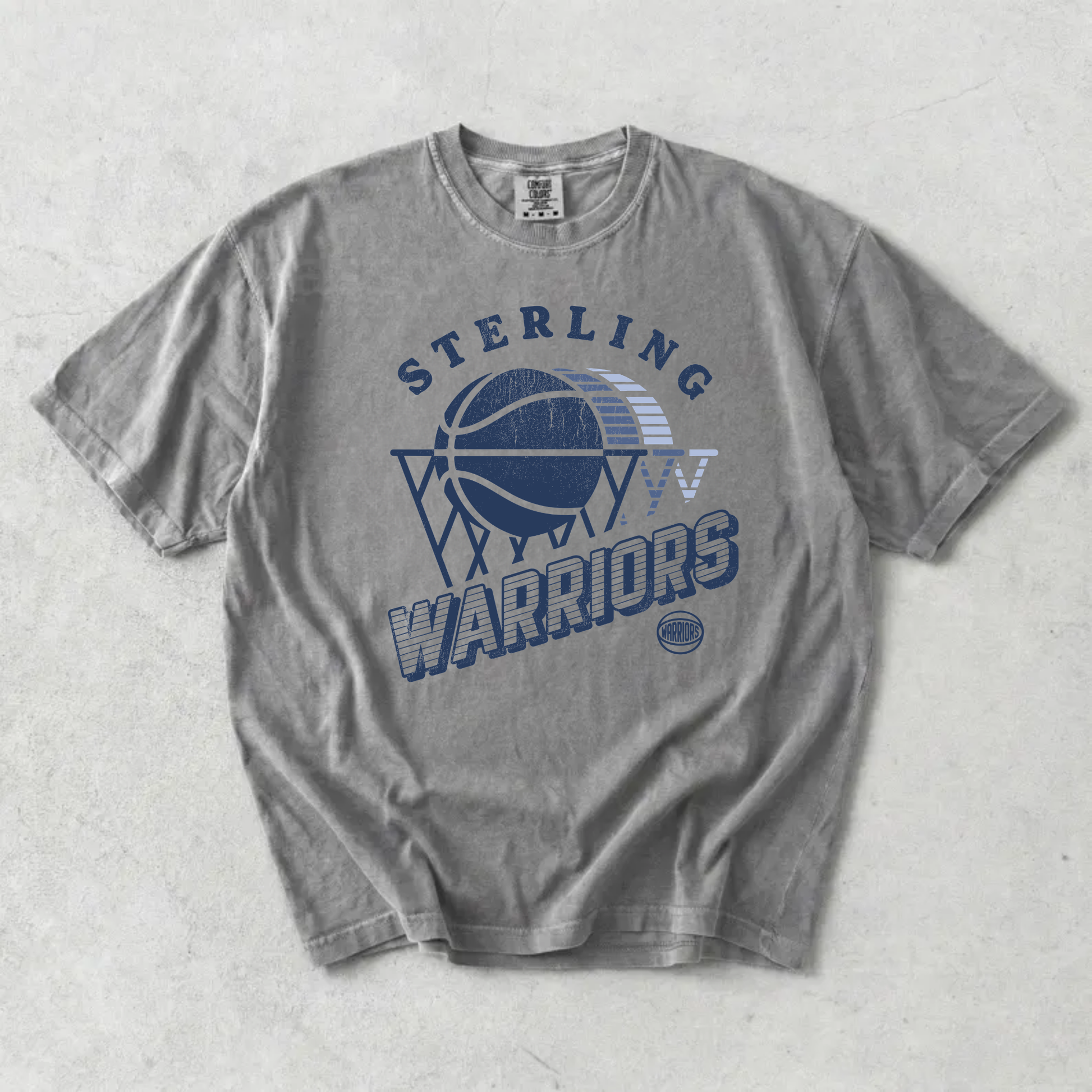 Grey Comfort Colors Sterling Warriors retro basketball graphic t-shirt with distressed vintage navy design.