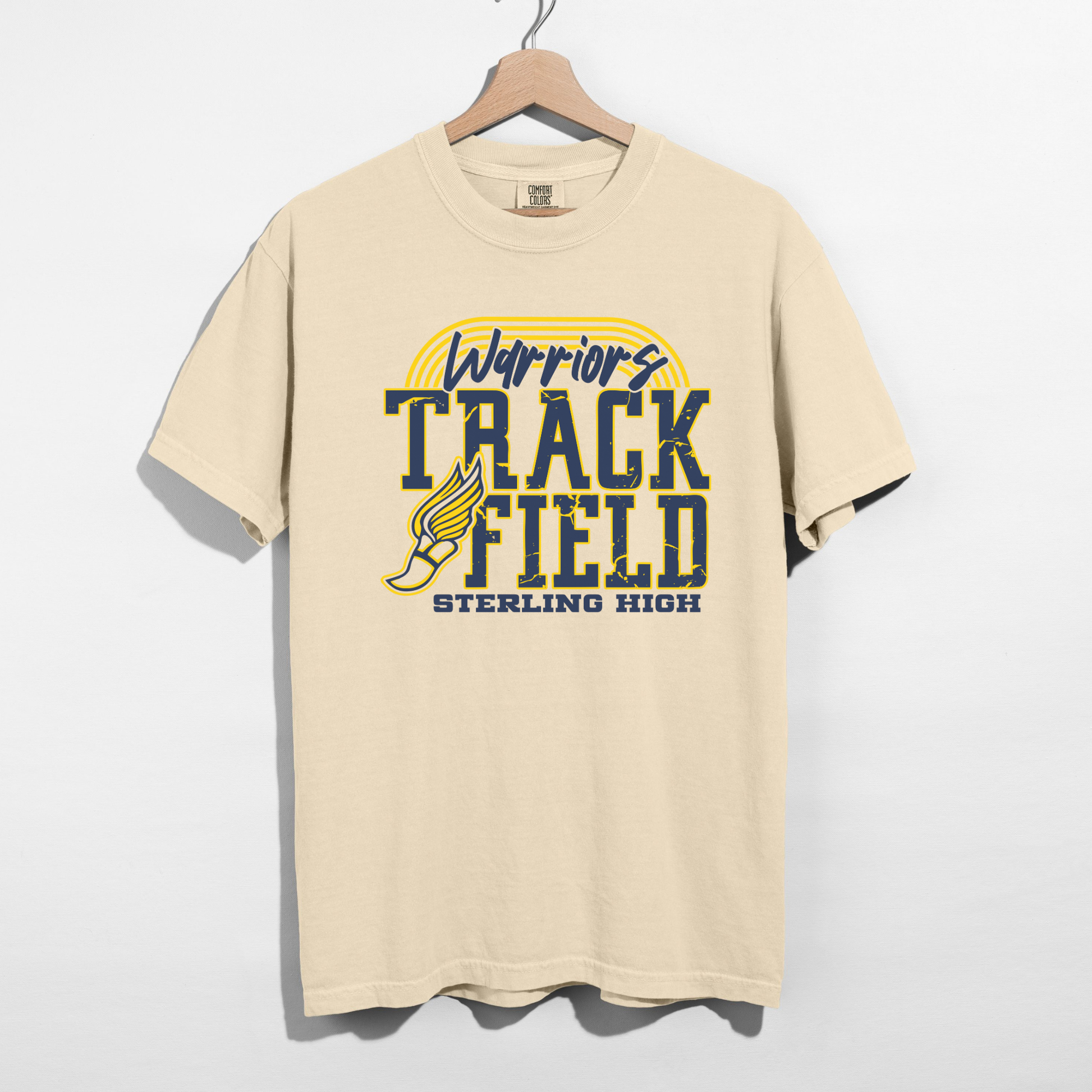 Beige t-shirt with 'Warriors Track Field Sterling High' text and logo on a white background