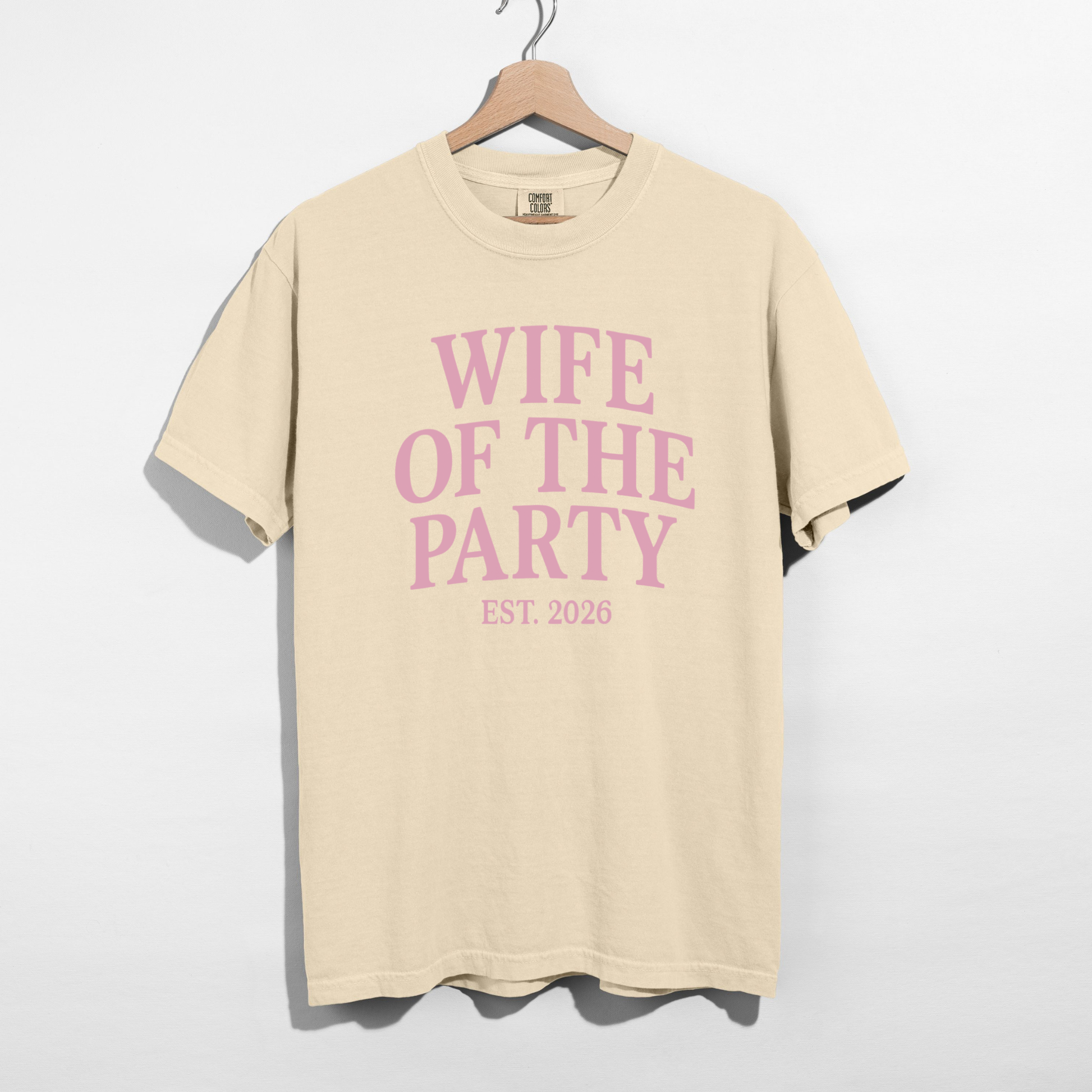 Ivory Wife of the Party t-shirt on hanger with Est. 2026 text