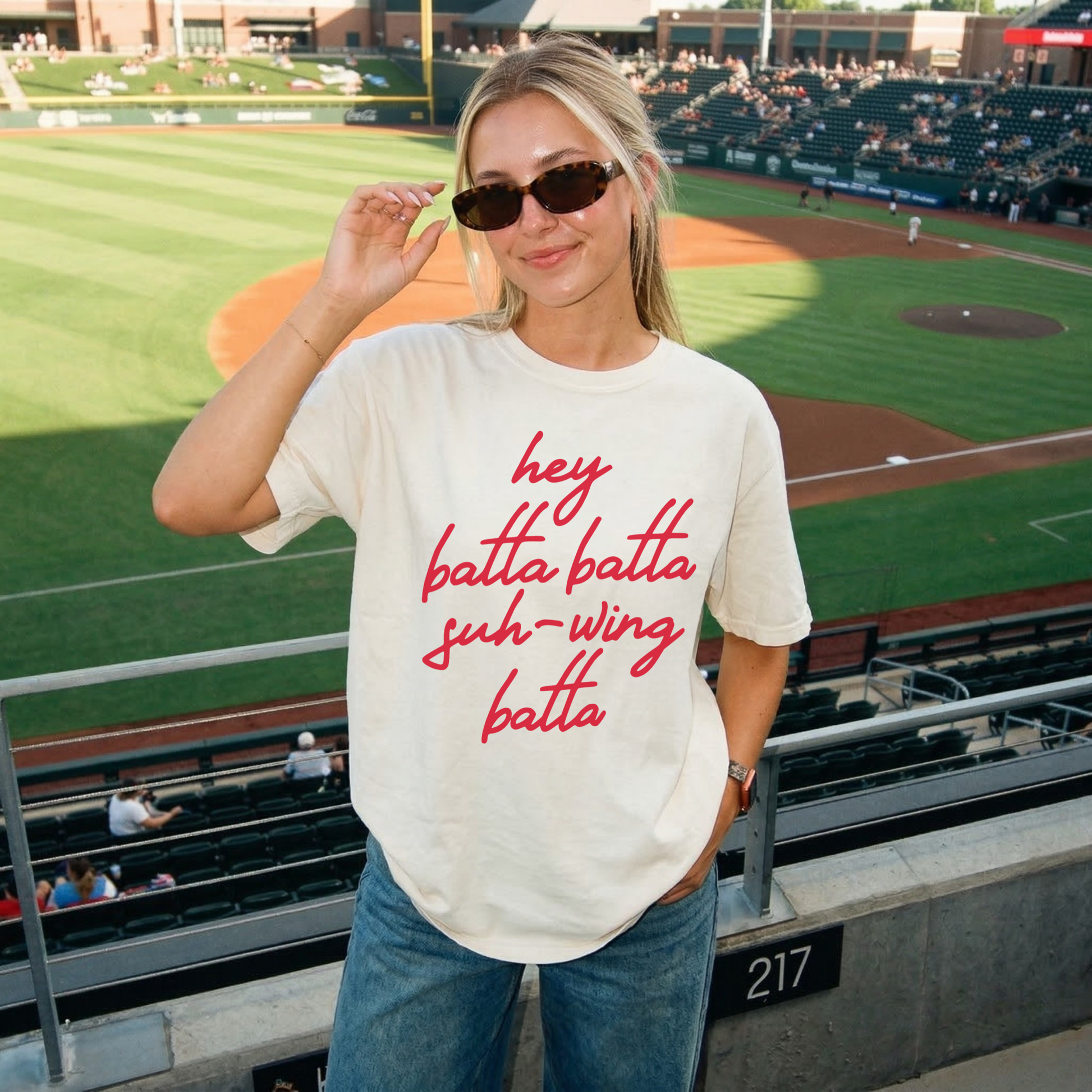 Ivory funny baseball shirt hey batta batta swing batta graphic tee styled at baseball game stadium