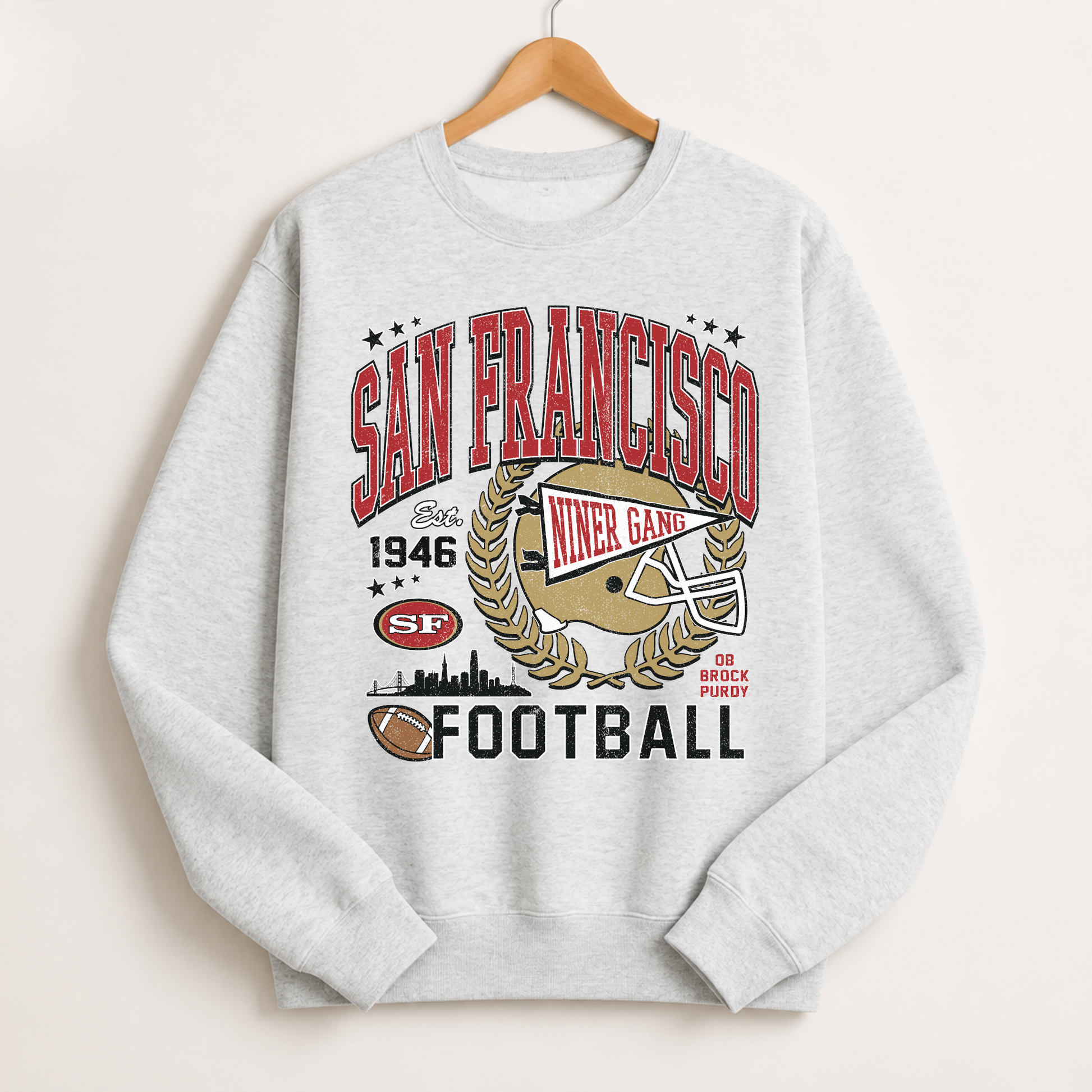 Heather gray San Francisco football crewneck with retro red and gold helmet and city football graphic