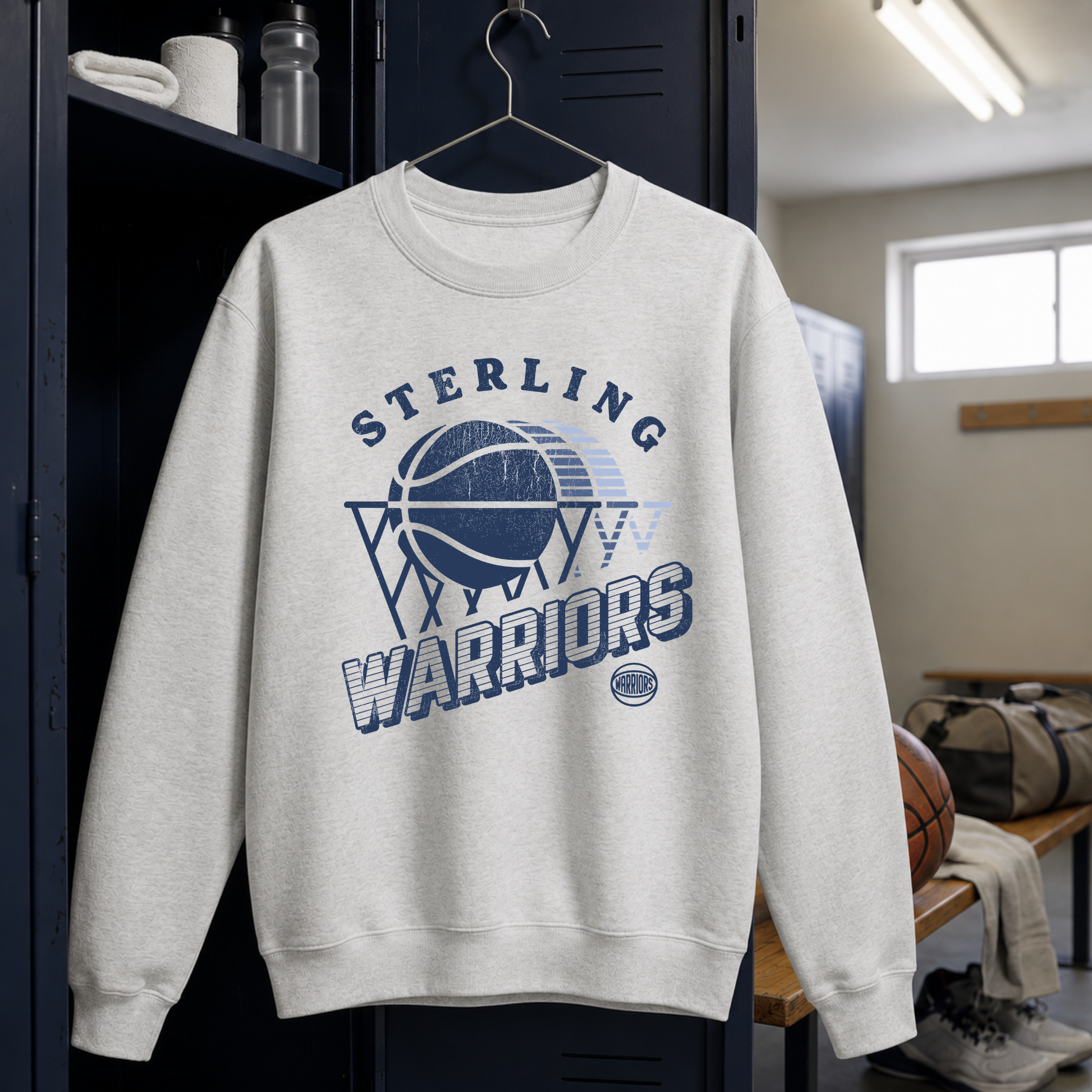 Oatmeal heather premium crewneck sweatshirt featuring a distressed Sterling Warriors retro basketball graphic hanging in a locker room.