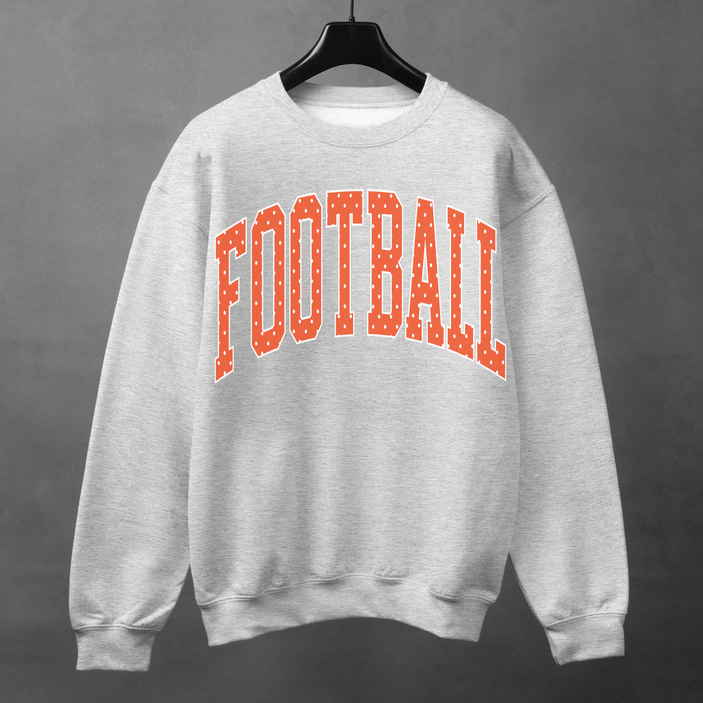 Heather grey football sweatshirt with orange polka dot varsity FOOTBALL graphic